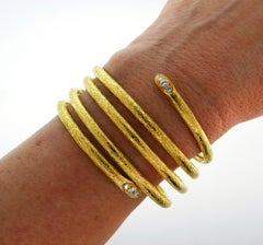 Van Cleef & Arpels Diamond Gold Bangle Bracelet Stylized Snake Spiral