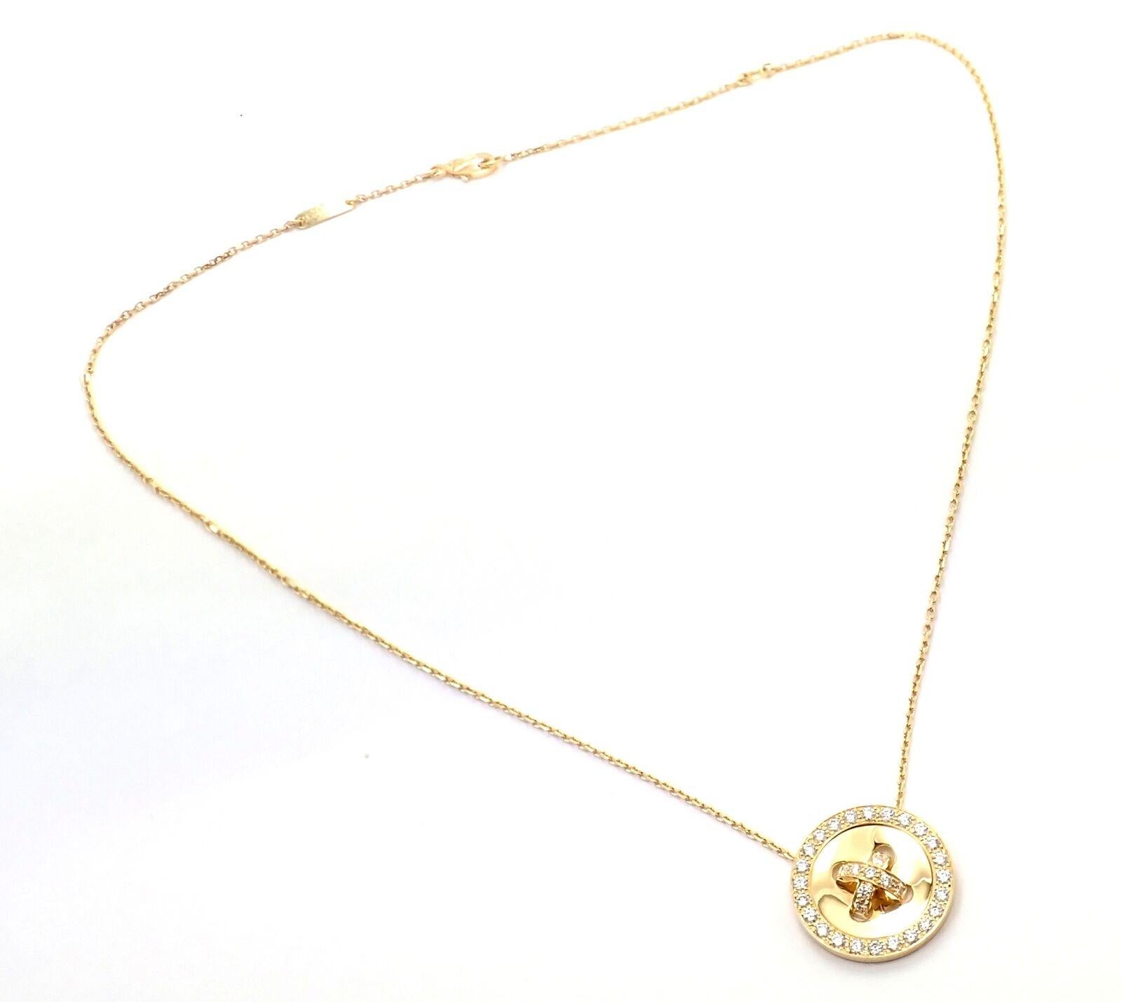 18k Yellow Gold Diamond Button Pendant Necklace by Van Cleef & Arpels.
With 34 Round Brilliant cut diamonds VS1 clarity, G color total weight approximately 1.00ct
This necklace comes with a service paper from a VCA store and a box.
Details:
Length: