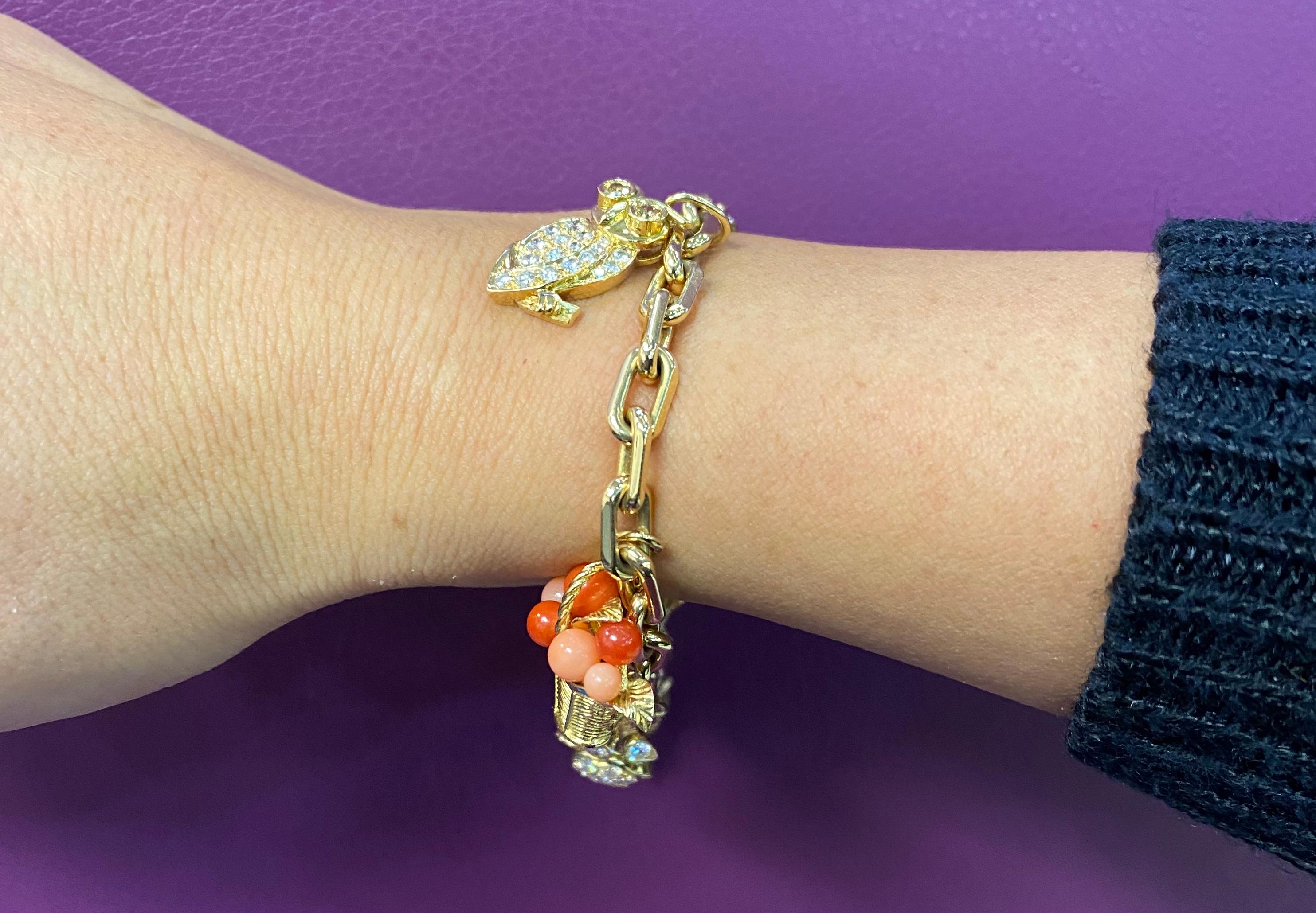 Van Cleef & Arpels Diamond & Gold Charm Bracelet In Excellent Condition In New York, NY