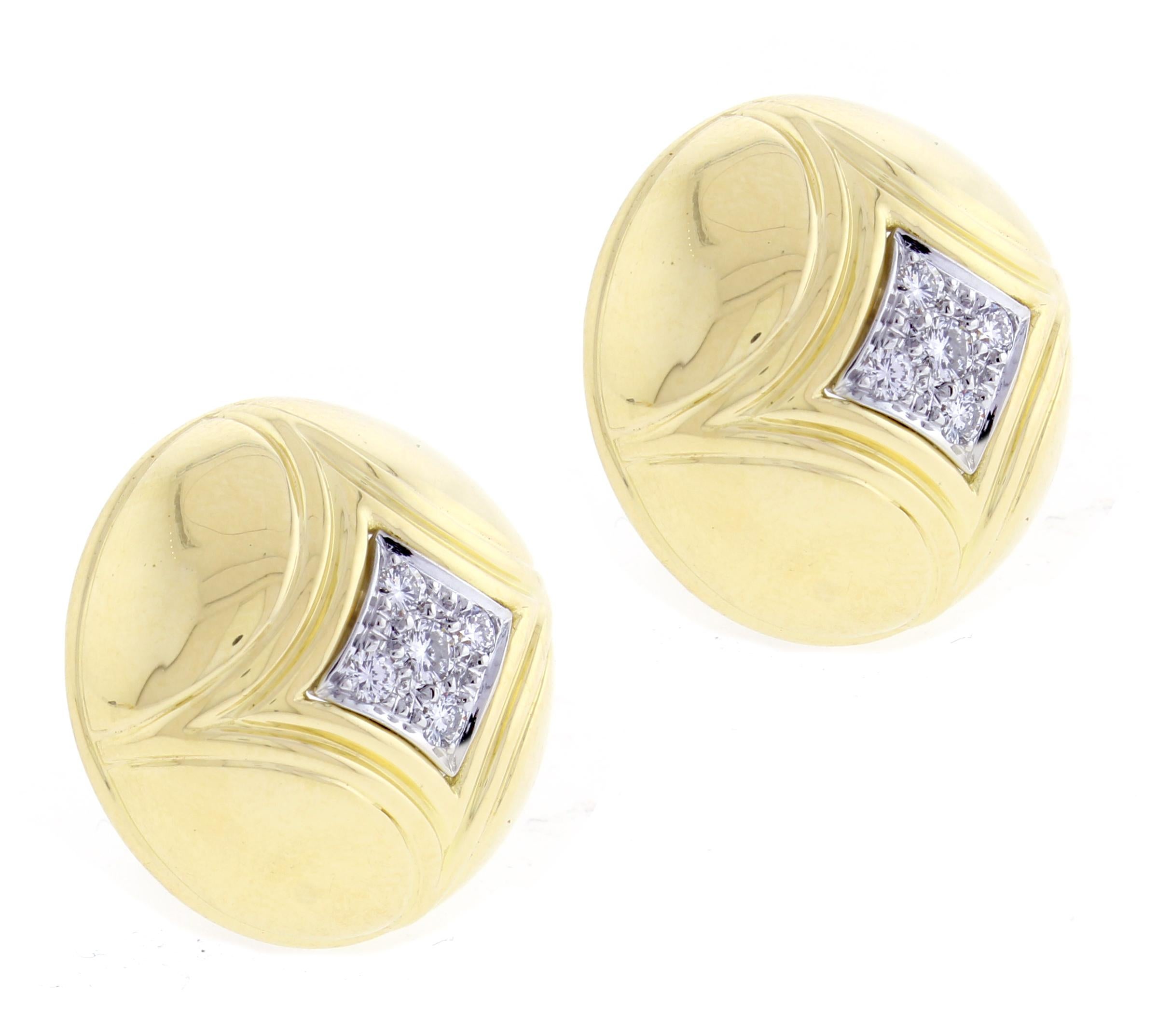 From Van Cleef & Arpels, a pair of diamond dome earrings. The 18 karat white gold dome earrings are 1 inch in diameter and 3/8 of an inch high. The 10 diamonds weigh approximately .50 carats. 24.5 grams 