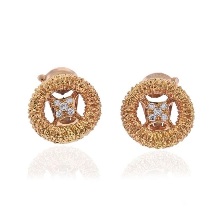 Circa 1960s 18k gold earrings by Van Cleef & Arpels set with 0.36ctwof VVS/F-G diamonds. Earrings measure 21mm in diameter. Marked VCA, V42859, 750. Weight - 13.4grams.