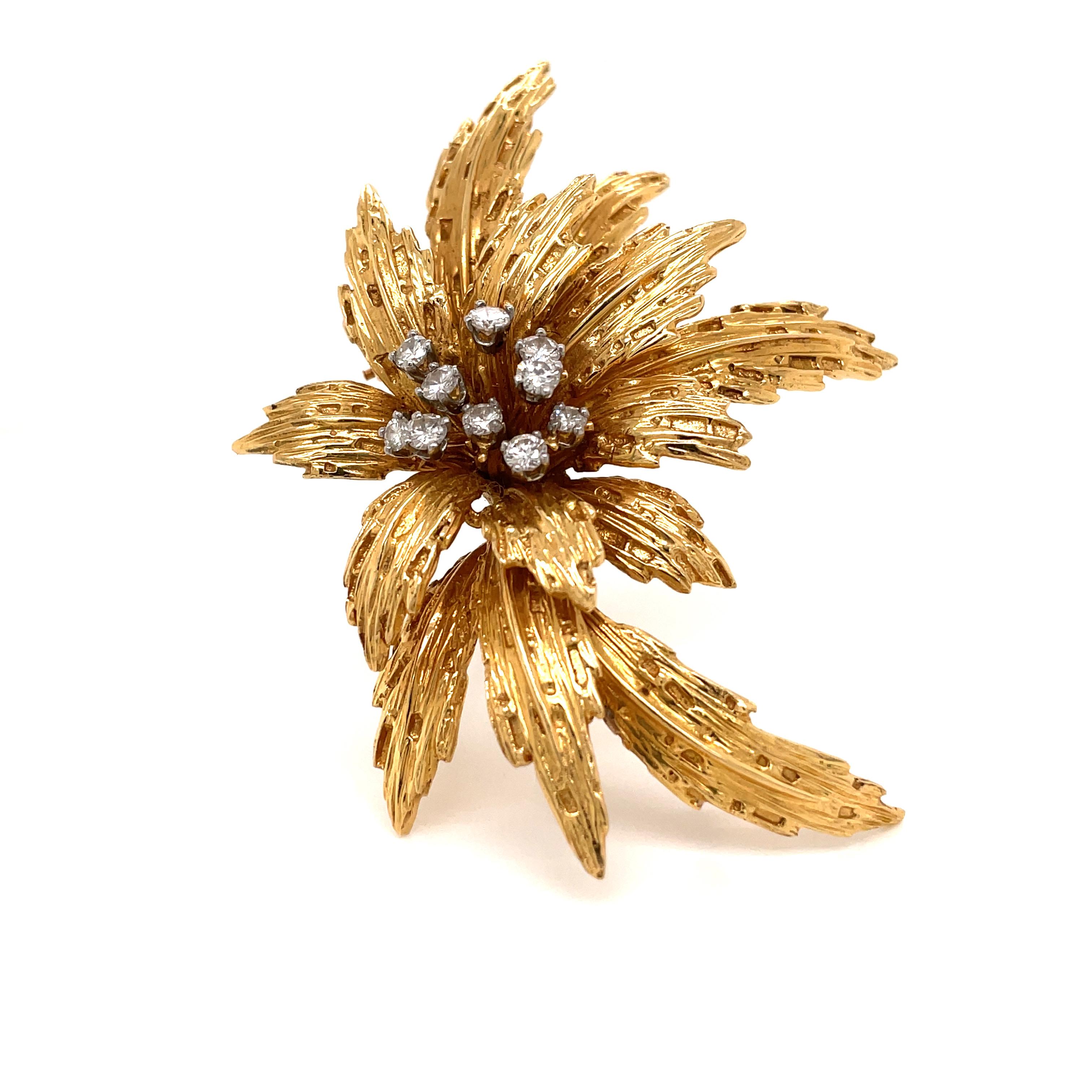 A fabulous 1960's floral motif brooch set with approx. 1.50 total ct of round cut diamonds.
Handmade 18k gold mounting;  This piece is designed and crafted entirely by hand in the traditional way, using age old techniques and processes. Signed and