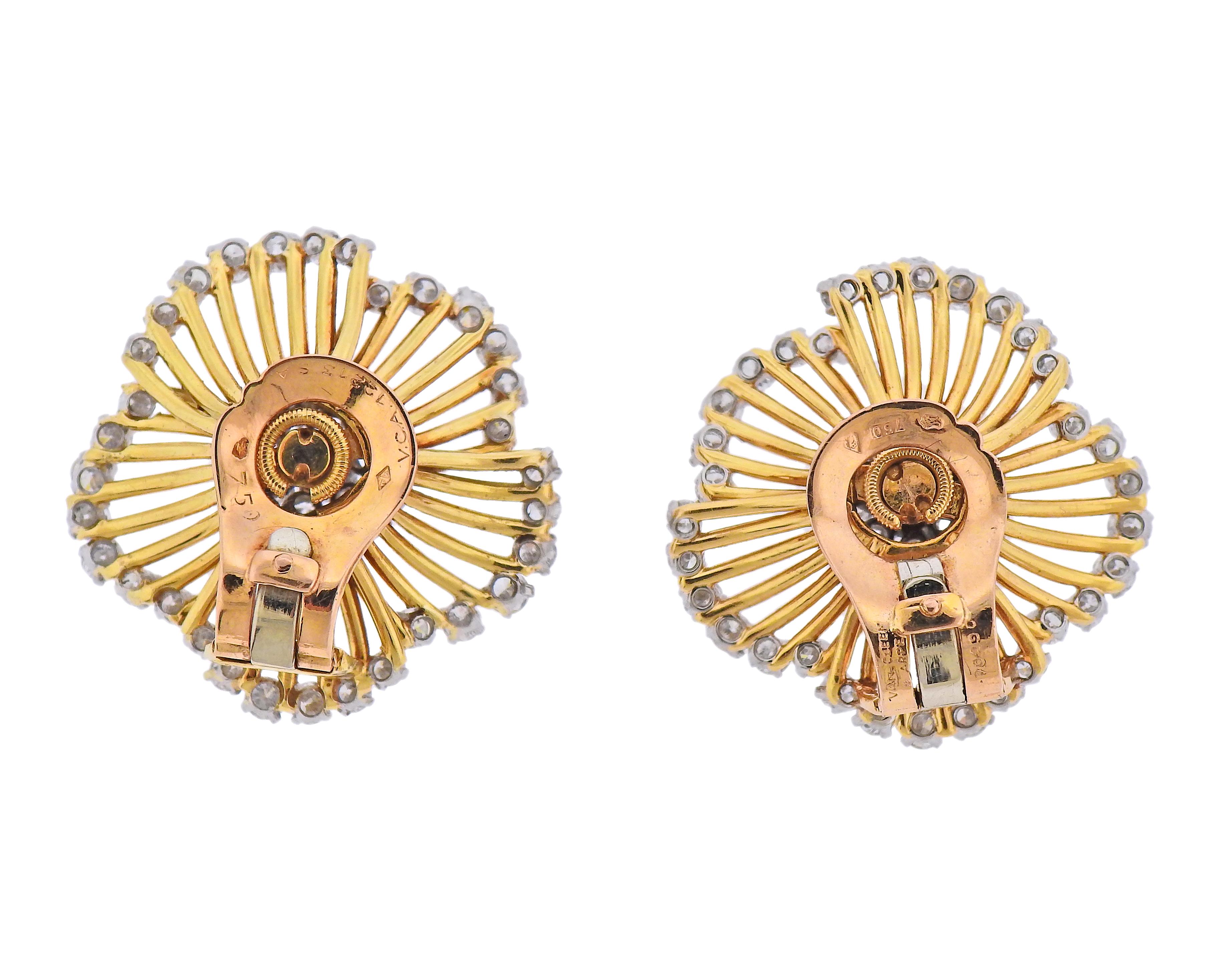 Pair of 18k gold flower earrings by Van Cleef & Arpels, with approx. 4.00cts in diamonds. Earrings are 30m x 30mm. Marked: 750, Van Cleef & Arpels, 70290. Weight - 23.2 grams. 