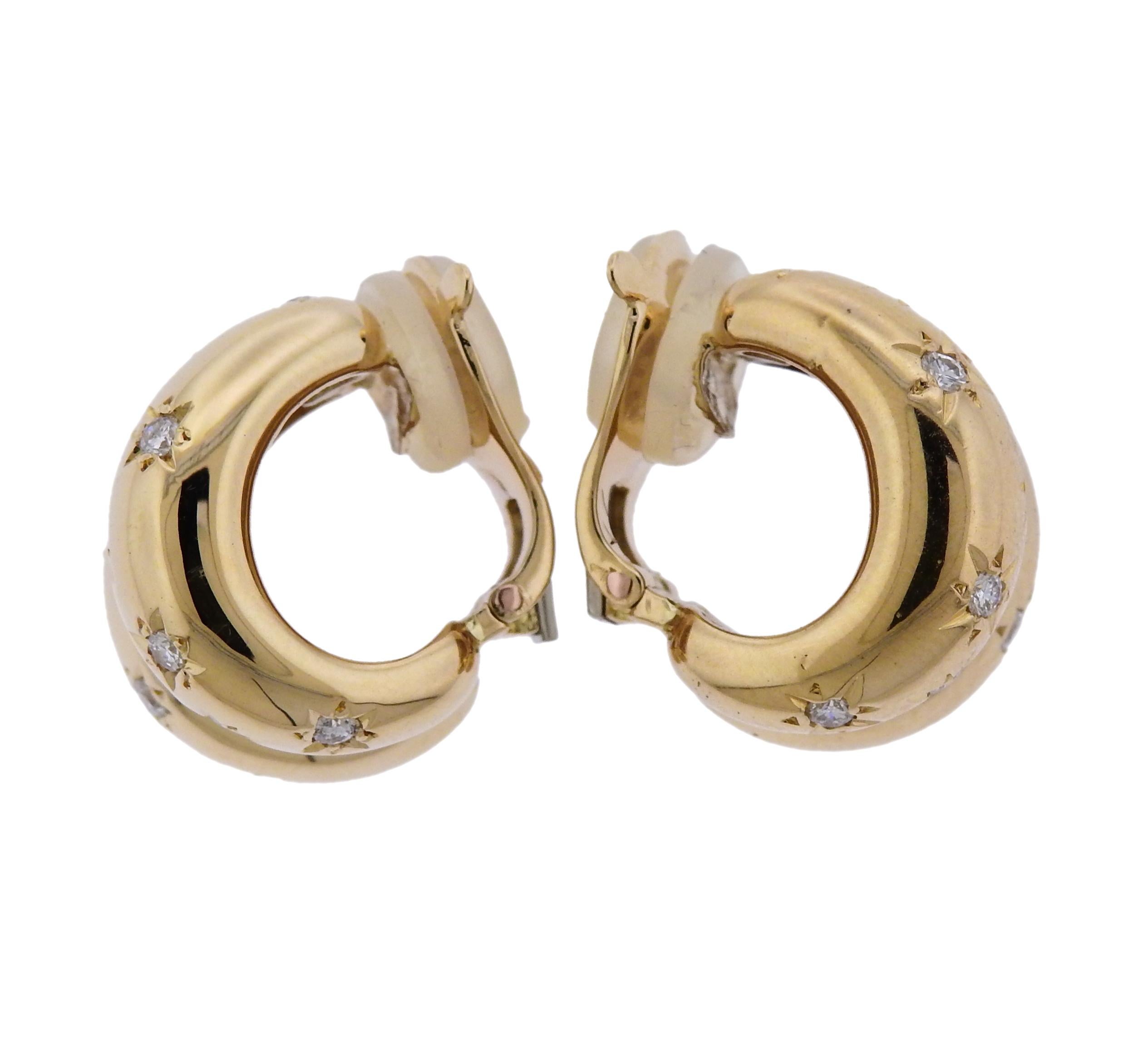 18k yellow gold hoop earrings, crafted by Van Cleef & Arpels, adorned with a total of 0.50ctw in FG/VVS diamonds.  Earrings are 18mm x 13mm, weigh 14.7 grams. Marked: VCA, C3181A5, 0.50ct. 