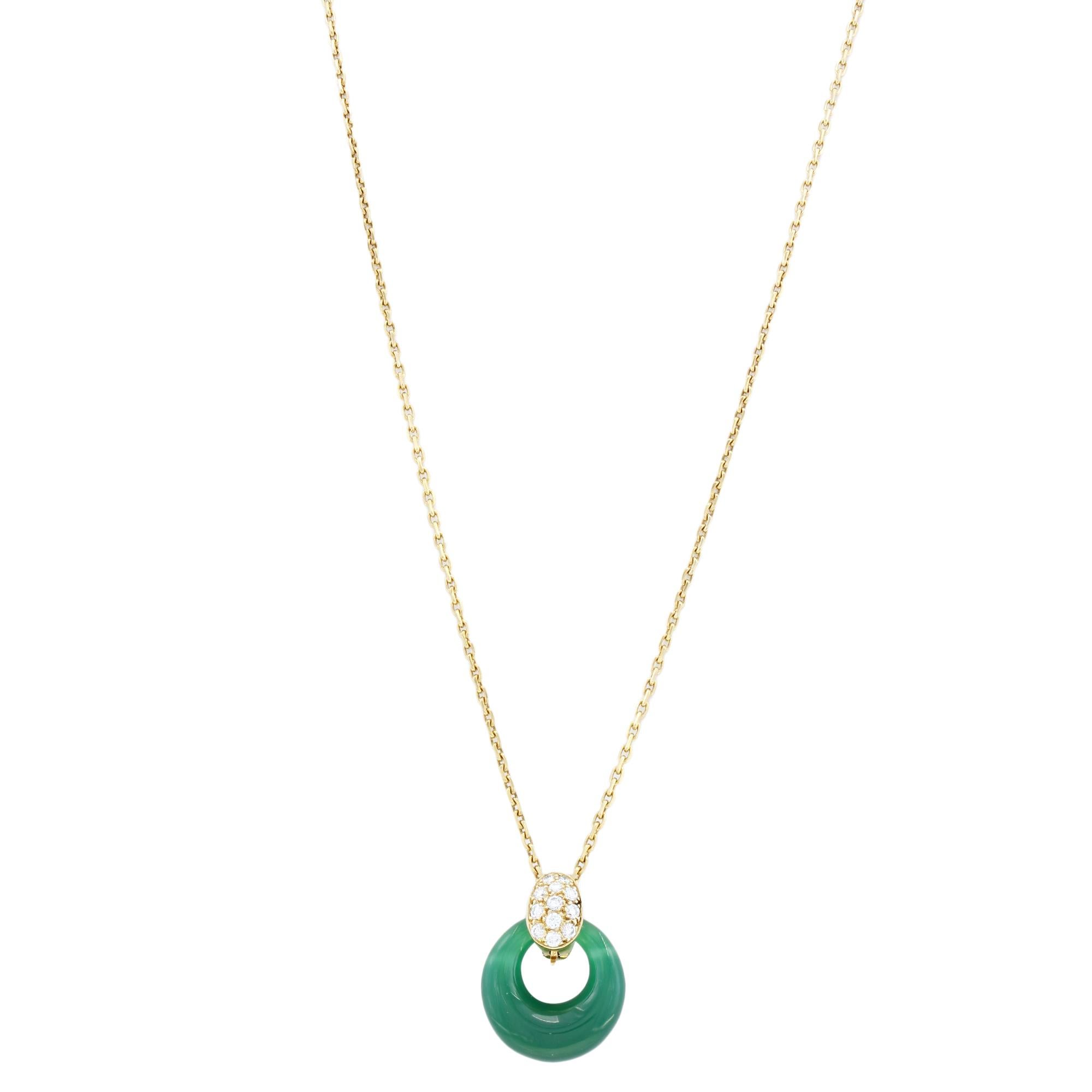 Van Cleef & Arpels Diamond Green Chalcedony Yellow Gold Pendant Necklace

This classic circa 1980s Van Cleef & Arpels necklace is crafted in 18k yellow gold and features a versatile pendant enhancer set with brilliant-cut round diamonds of an