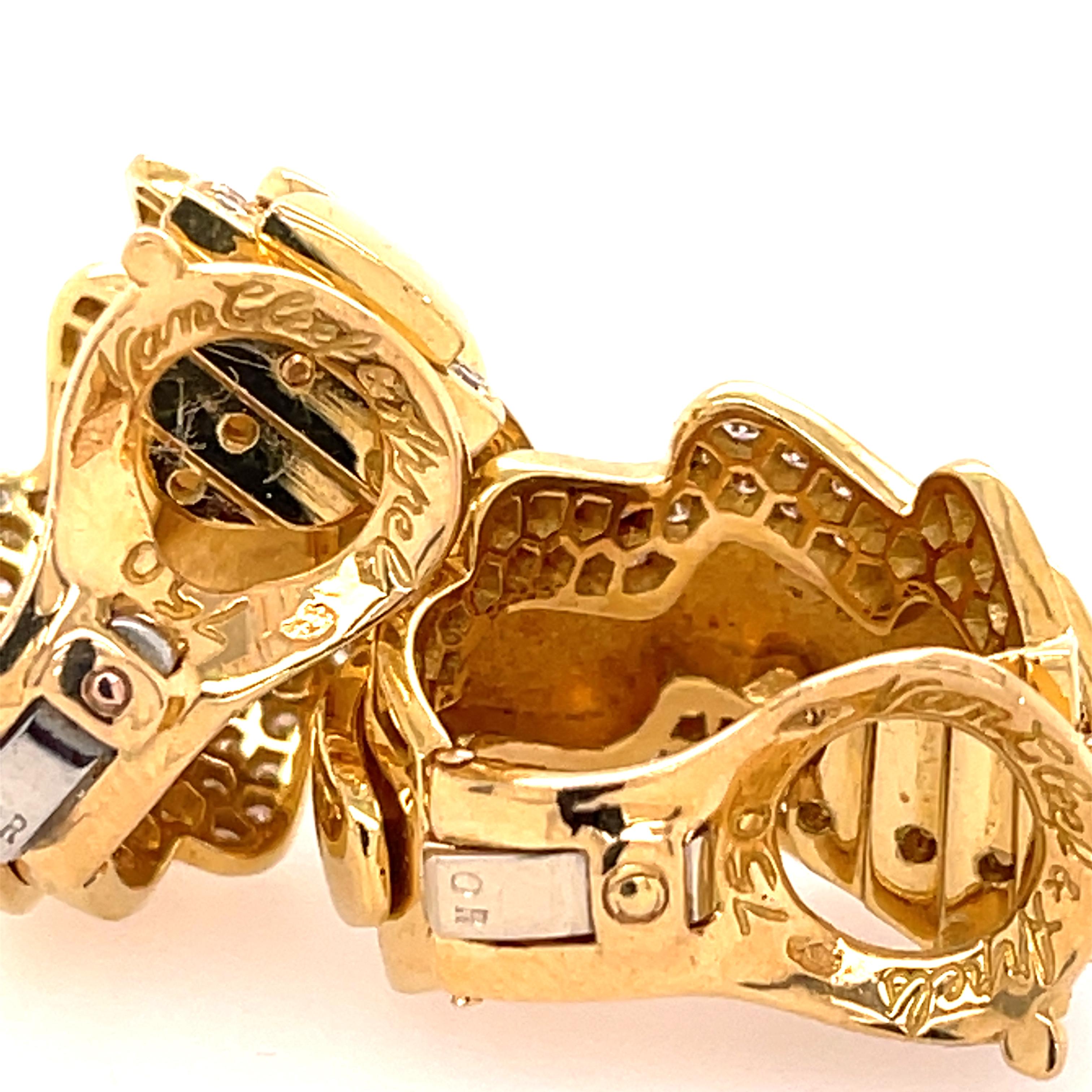 Van Cleef & Arpels diamond hoops in 18K yellow gold. Stamped Van Cleef & Arpels 750.