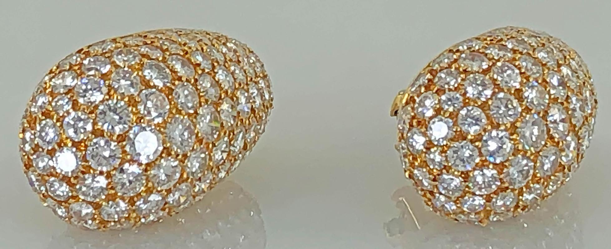  18k yellow gold diamond bombe oval design earrings signed Van Cleef & Arpels.