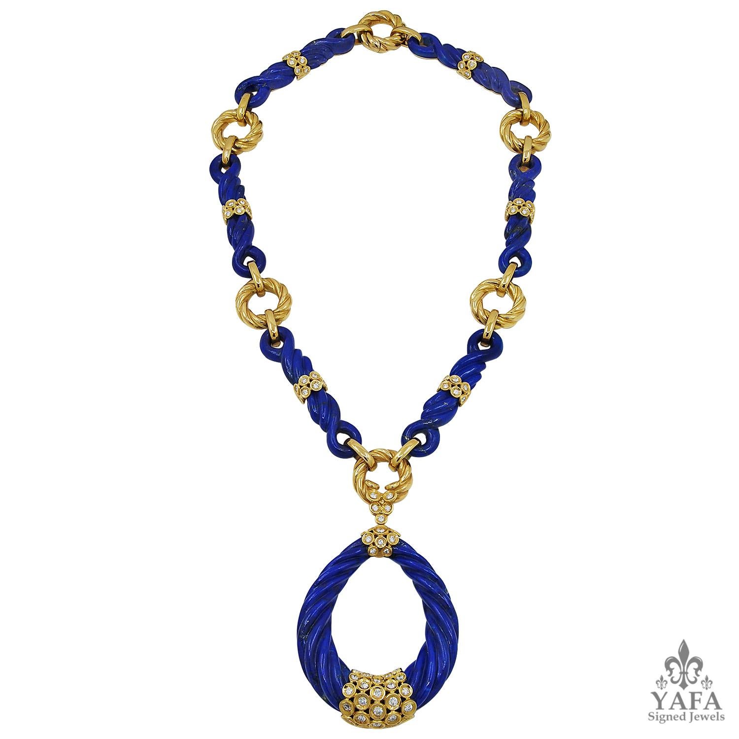 Van Cleef & Arpels Vintage 1970s Diamond Lapis Lazuli Pendant-Necklace Elizabeth Taylor Style
An 18k yellow gold pear shaped twisted lapis lazuli pendant necklace decorated with circular gold accents set with diamonds.
dimensions – necklace approx.
