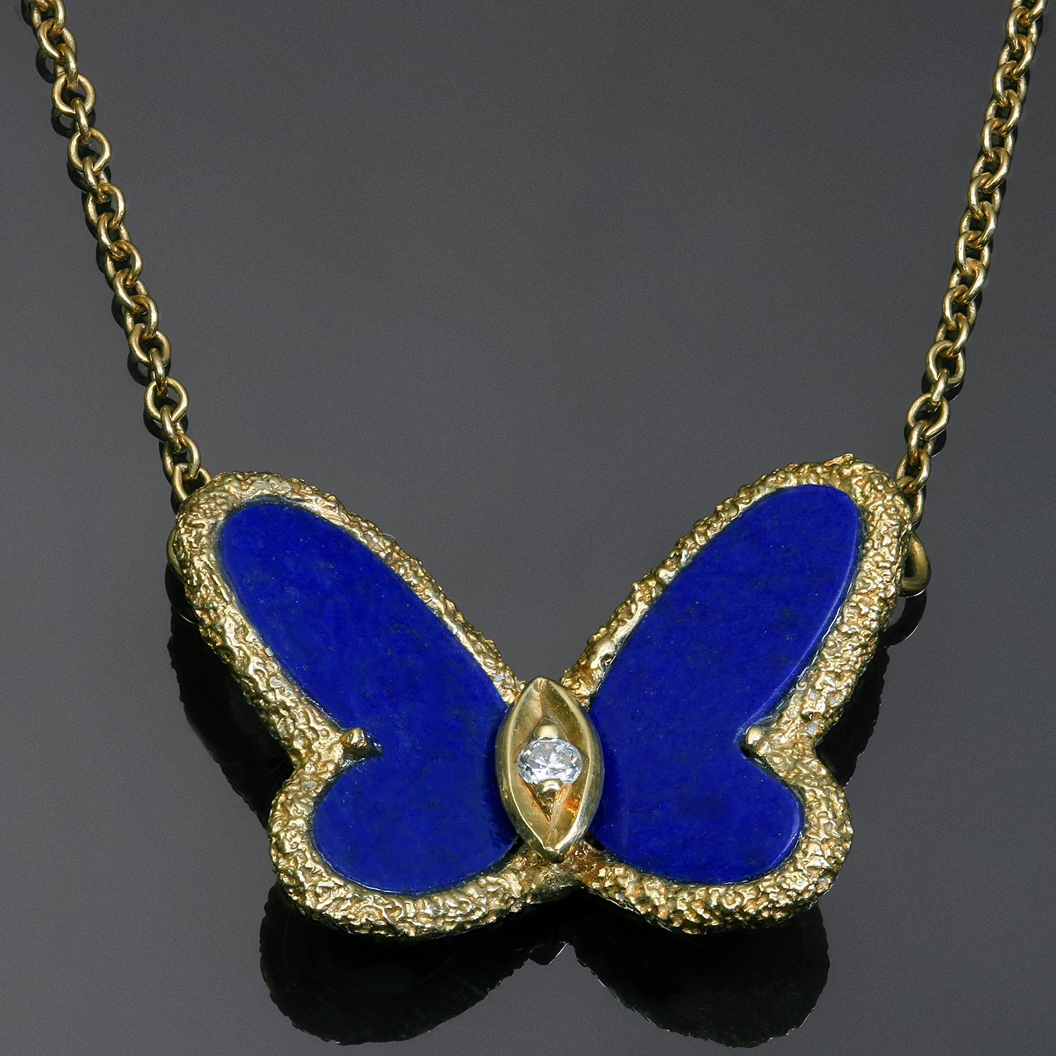 This iconic Van Cleef & Arpels necklace is crafted in 18k yellow gold and features a butterfly shaped pendant suspended from a link chain and accented with blue lapis lazuli wings and a brilliant-cut round diamond of an estimated 0.03 carats. Made