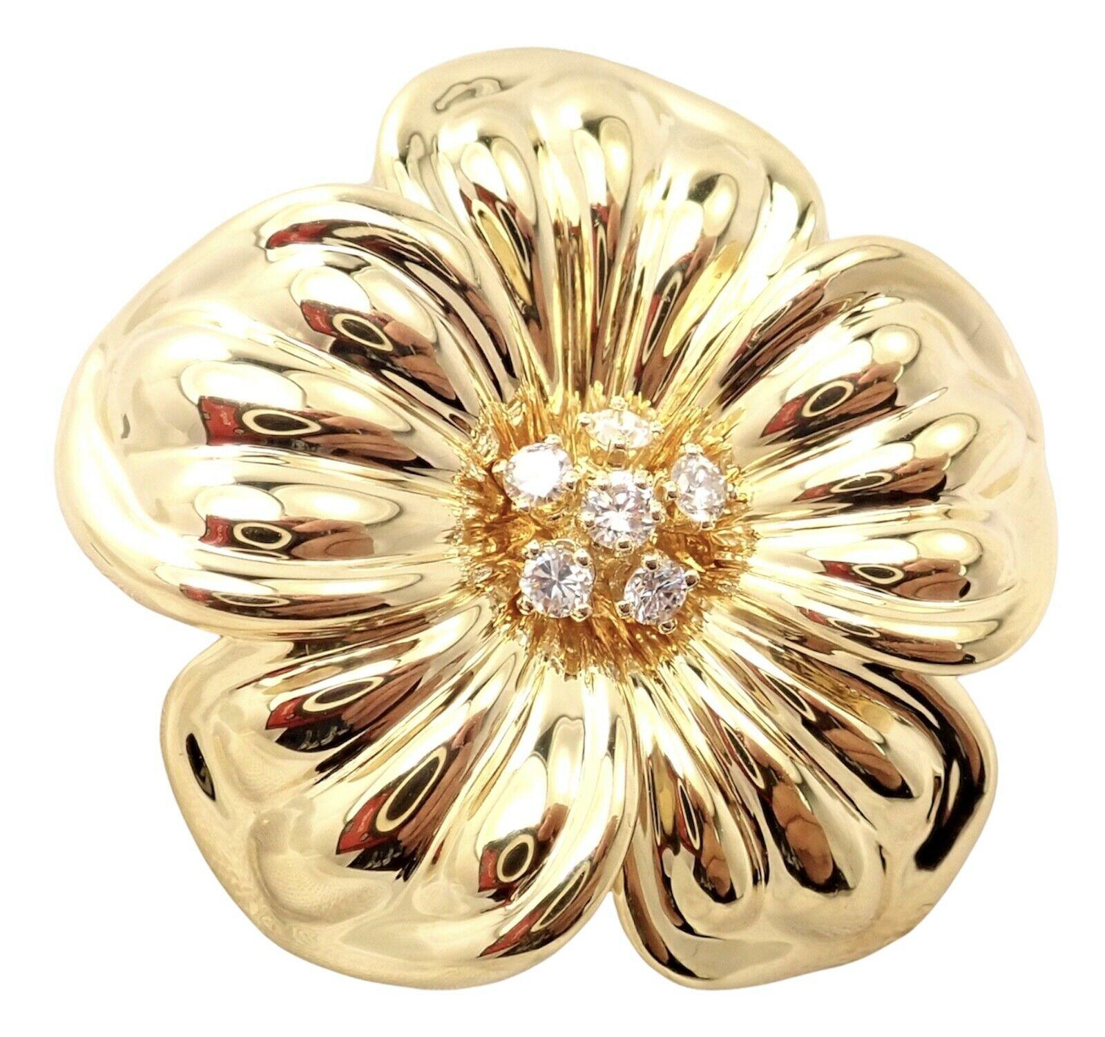 18k Yellow Gold Magnolia Flower Diamond Pin Brooch by Van Cleef & Arpels. 
With 6 round brilliant cut diamonds VVS1 clarity, E color total weight approx. .49ctw
This brooch comes with Van Cleef & Arpels service paper.
Details: 
Measurements: 39mm x