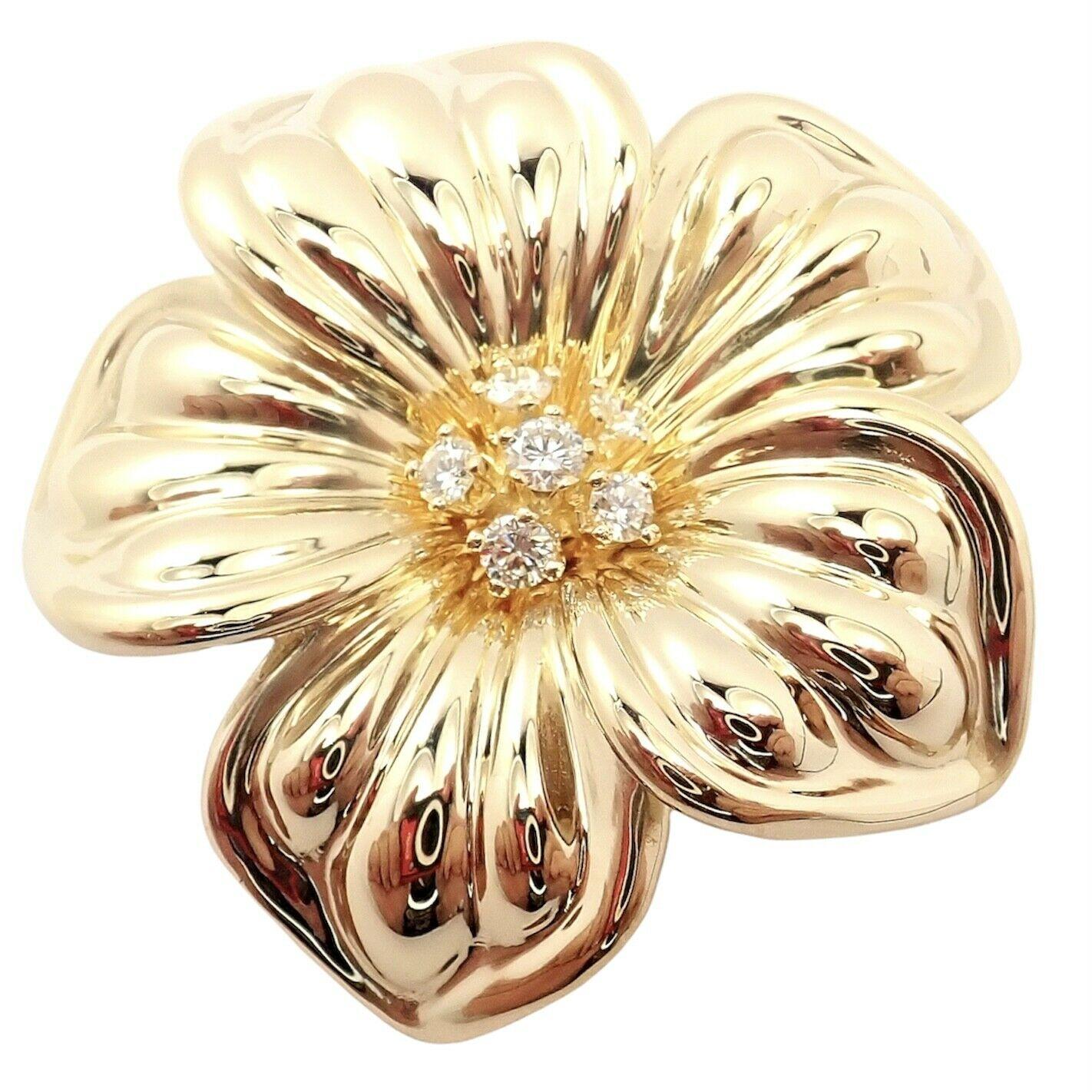 18k Yellow Gold Magnolia Flower Diamond Pin Brooch by Van Cleef & Arpels. 
With 6 round brilliant cut diamonds VVS1 clarity, E color total weight approx. .49ctw
This brooch comes with Van Cleef & Arpels service paper.
Details: 
Measurements: 40mm x