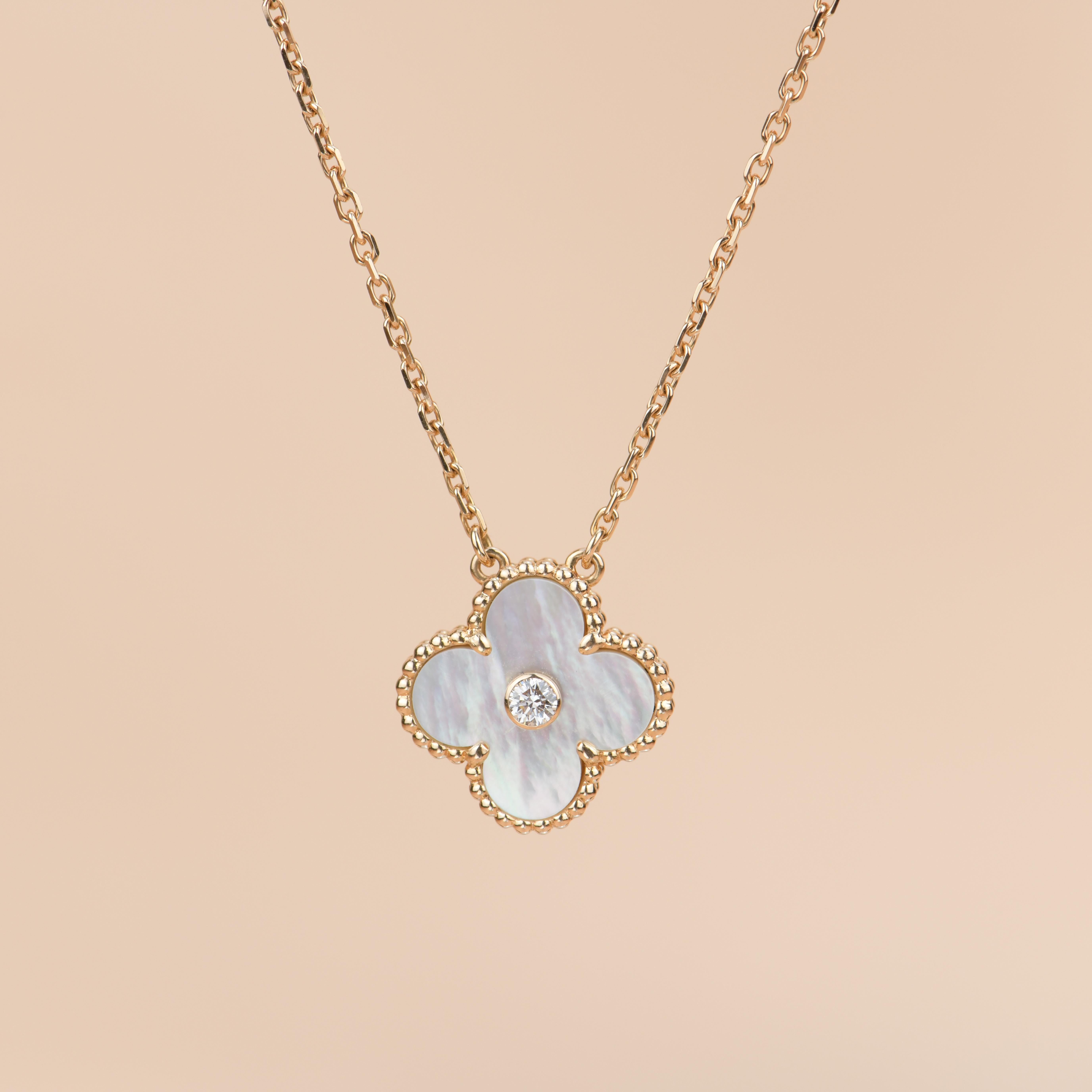 18k Rose Gold Limited Edition Mother Of Pearl Necklace was released in 2012 Christmas as the holiday pendant. VCA doesn't create this version anymore, truly collective piece!

Dandelion Antiques Code:  AT-1328
Brand:  Van Cleef & Arpels
Model: 