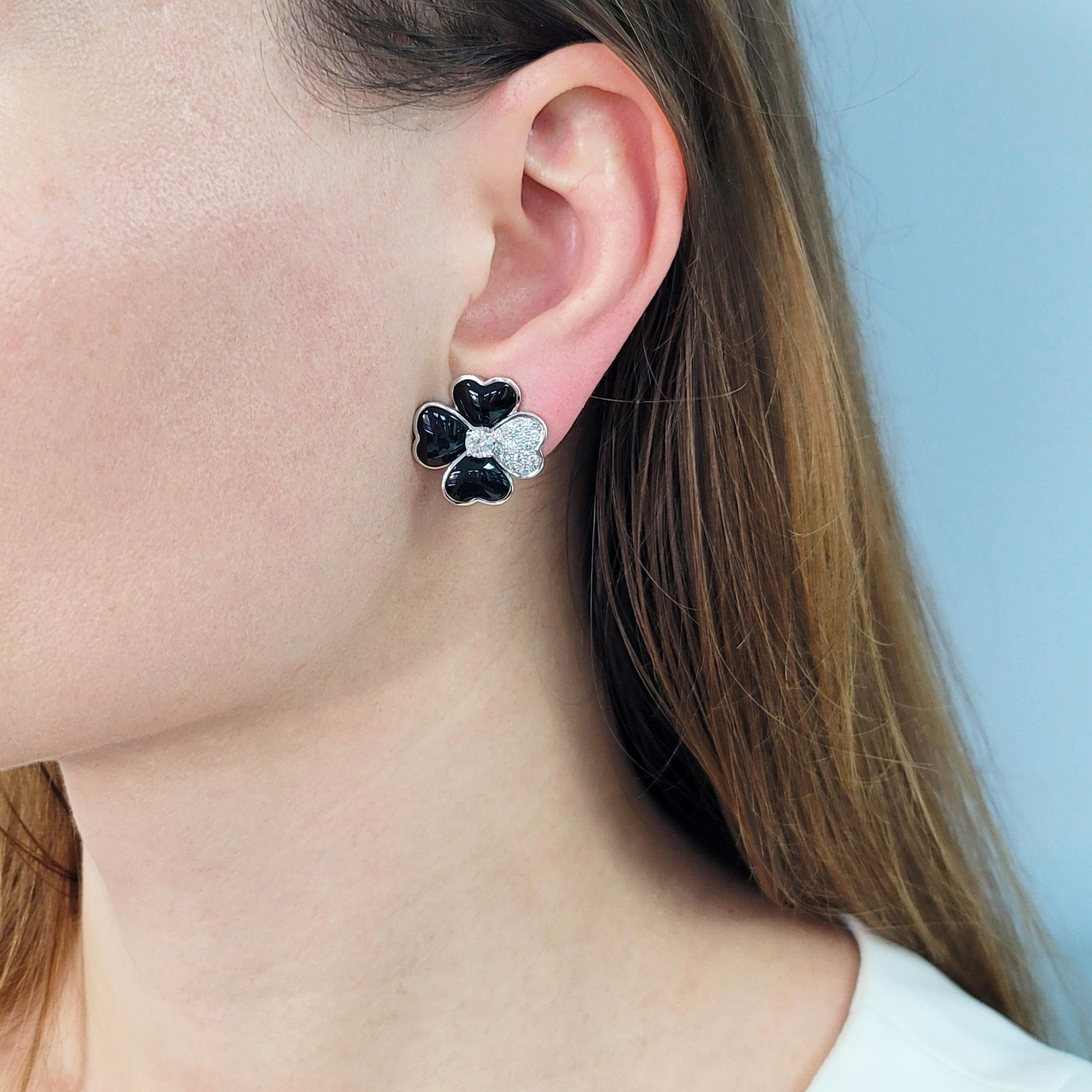 Artist Van Cleef & Arpels Diamond, Onyx, and White Gold 'Cosmos' Clip Earrings For Sale