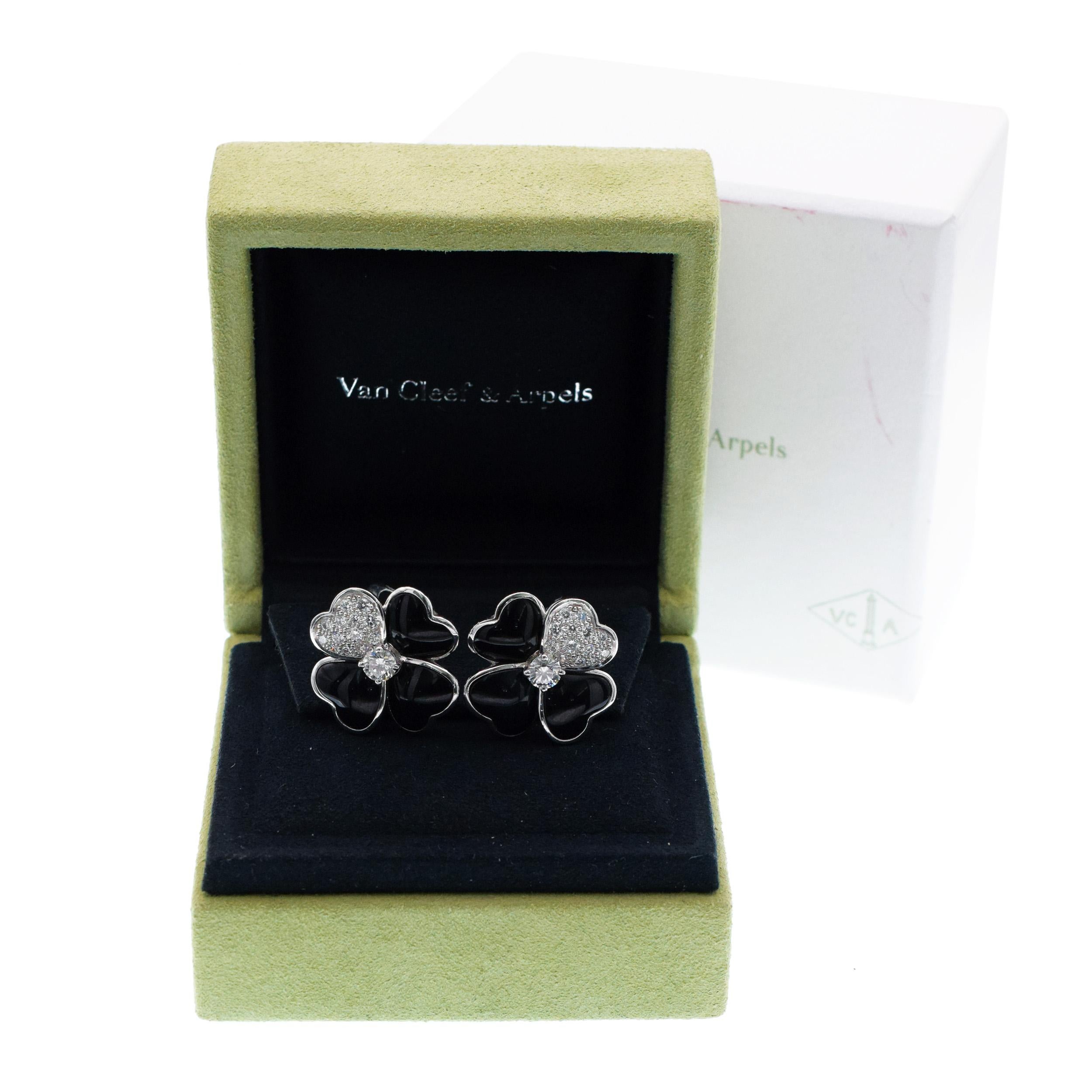 Round Cut Van Cleef & Arpels Diamond, Onyx, and White Gold 'Cosmos' Clip Earrings For Sale