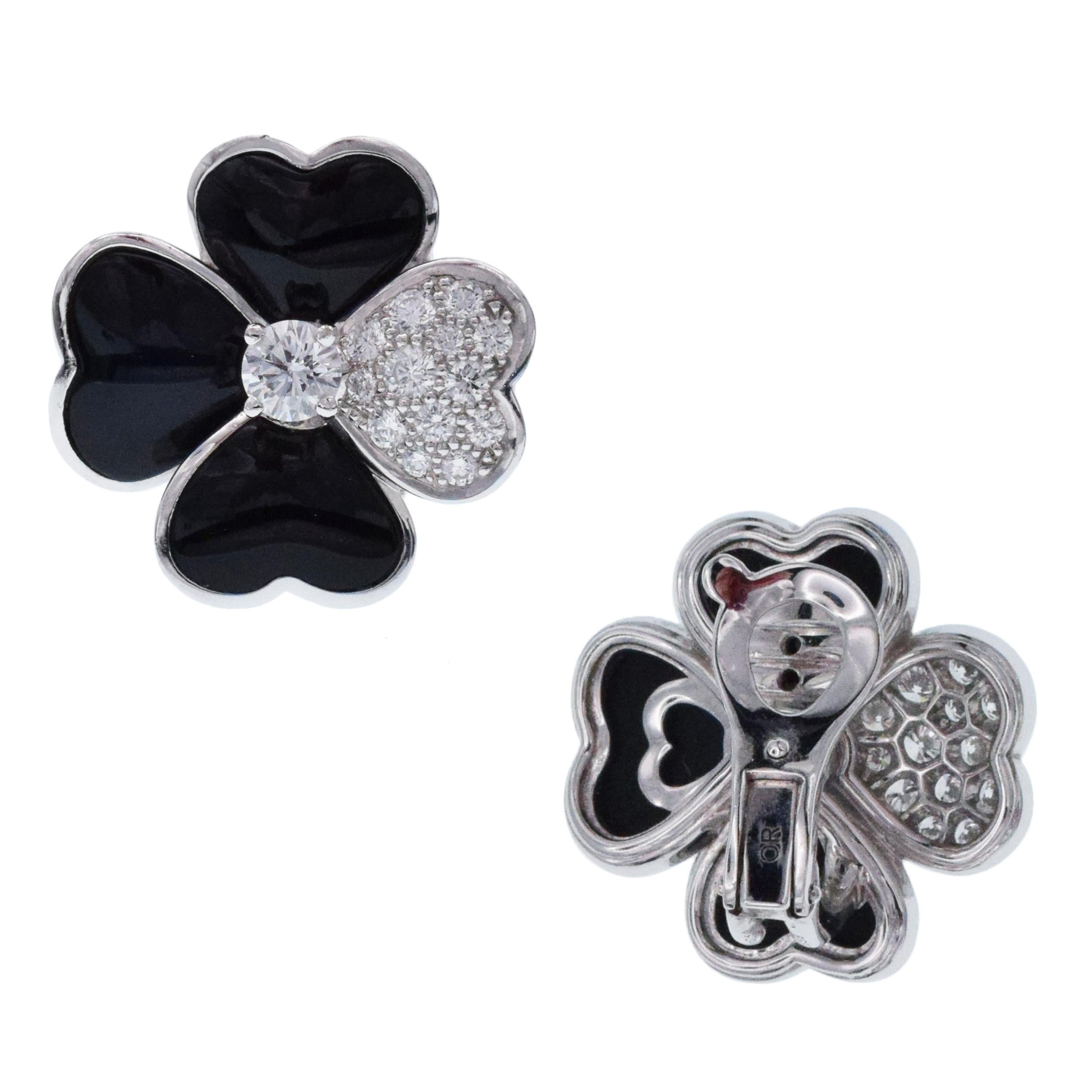 Van Cleef & Arpels Diamond, Onyx, and White Gold 'Cosmos' Clip Earrings For Sale 2