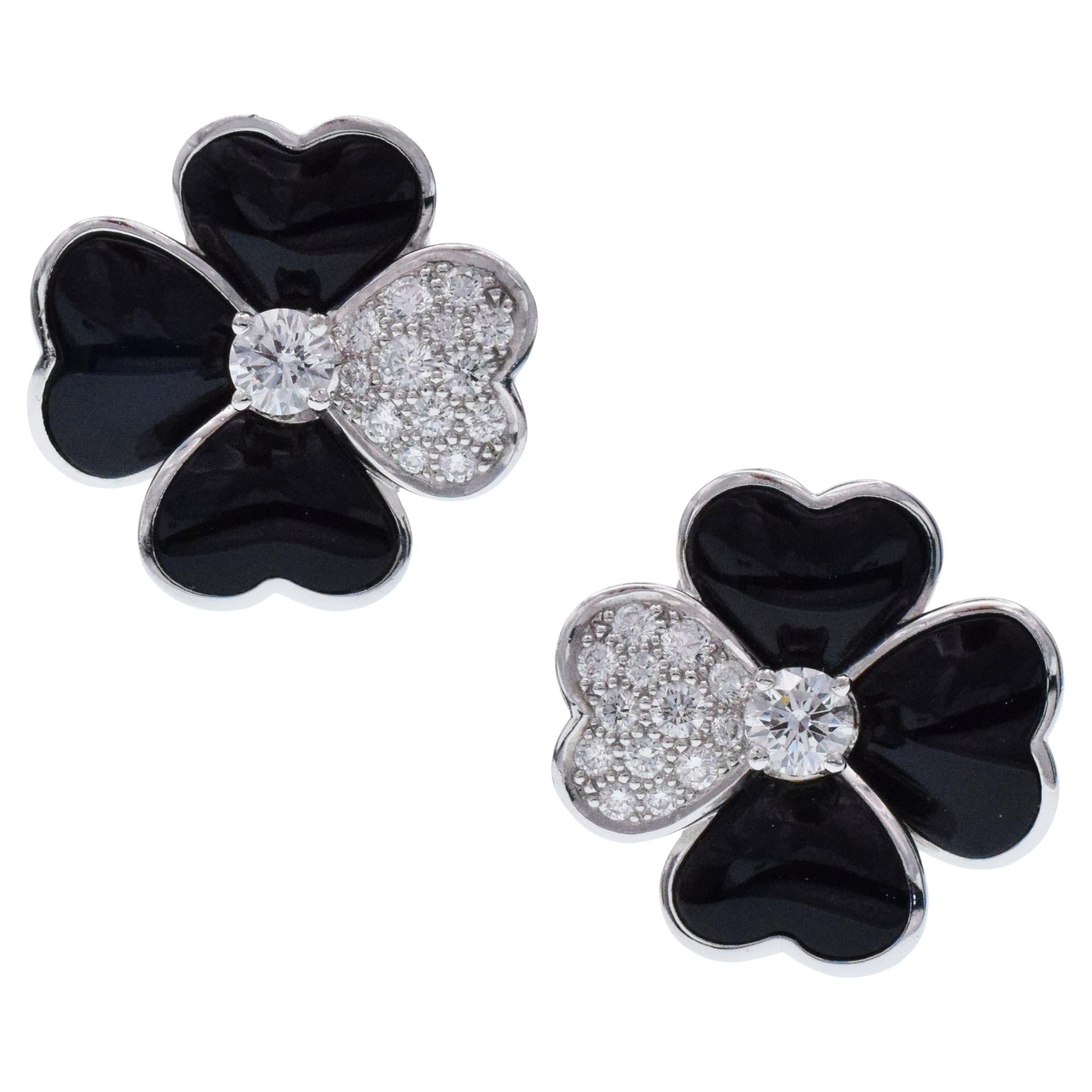 Van Cleef & Arpels Diamond, Onyx, and White Gold 'Cosmos' Clip Earrings