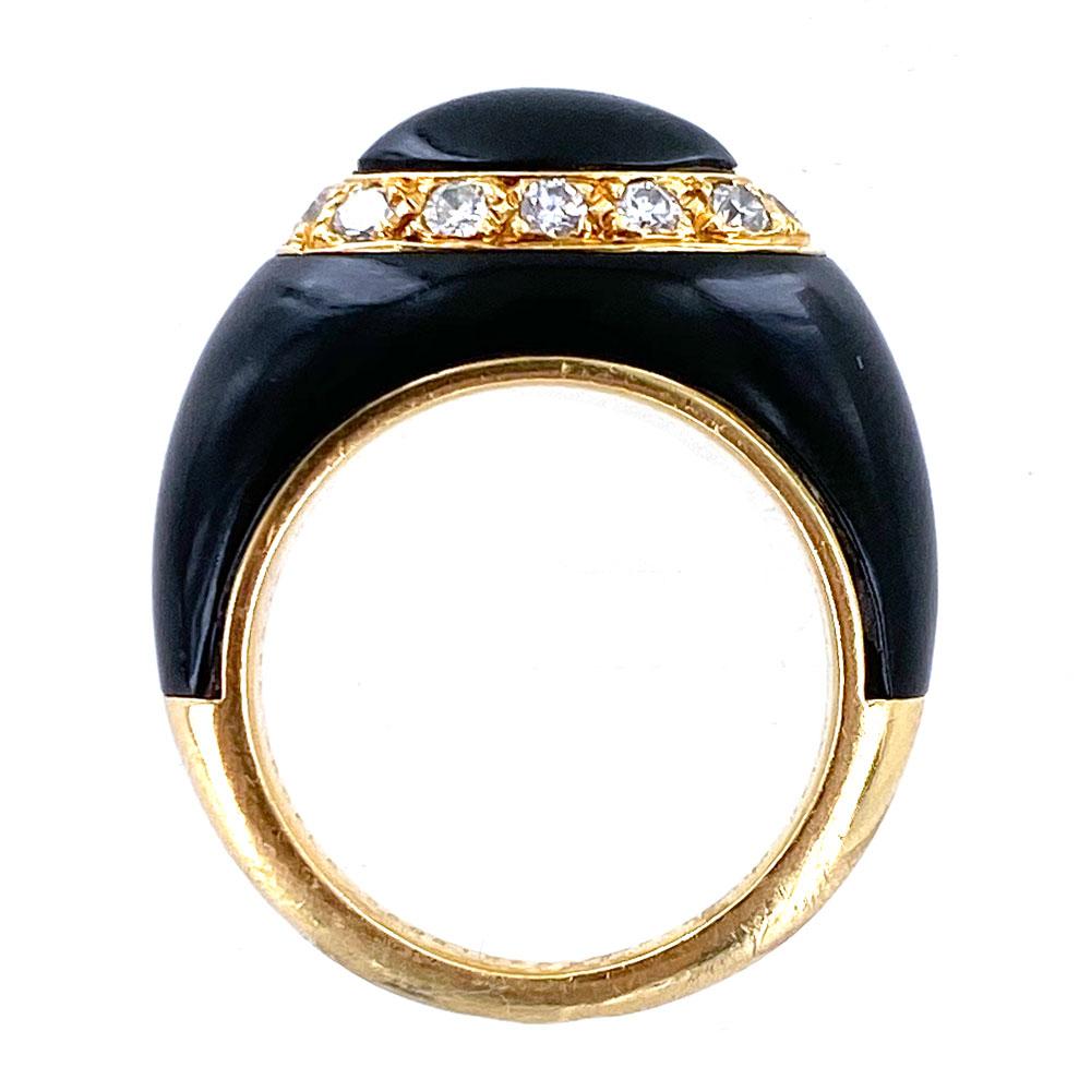 1970's estate ring by Van Cleef & Arpels. The onyx and diamond ring features 12 round brilliant cut diamonds weighing approximately .44 carats. The diamonds are all graded D-E-F/IF-VVS. The ring is size 5.75 and signed Van Cleef & Arpels, numbered,