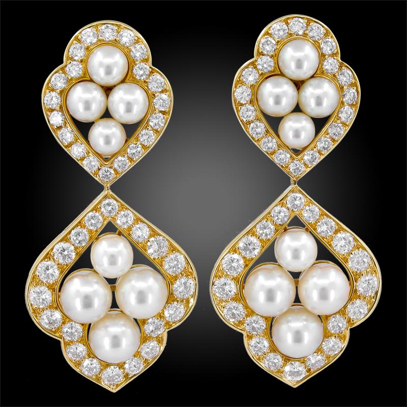Van Cleef & Arpels Diamond Pearl Collar Suite in 18k Yellow Gold.

Emblematic of the magnificent pearl jewels from Van Cleef & Arpels in the 1980s, this suite includes an articulated collar-length necklace, bracelet, and a pair of drop earrings. The