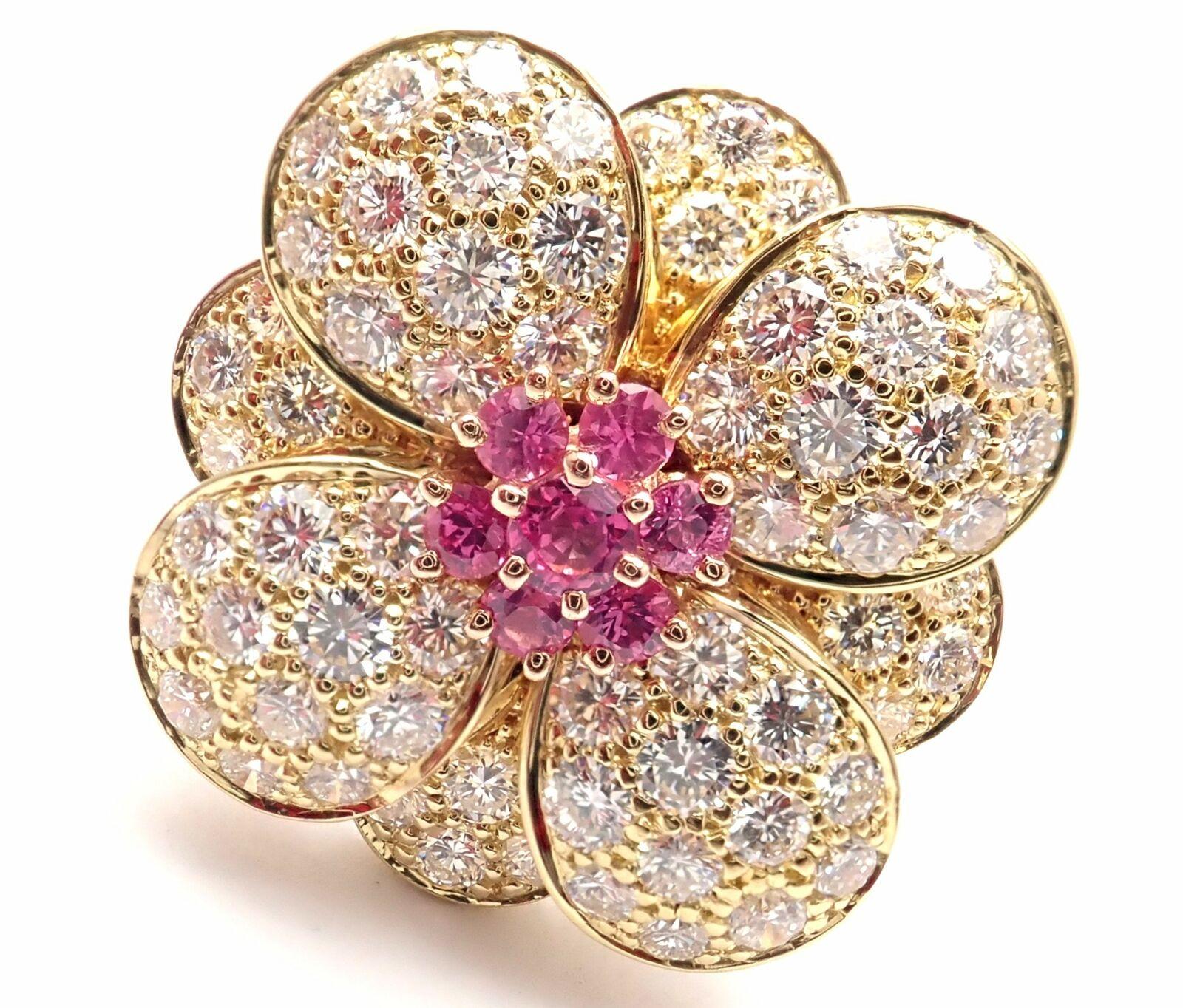 18k Rose Gold Diamond And Pink Sapphire Flower Ring by Van Cleef & Arpels.
With brilliant cut diamonds VVS1 clarity, E color and 7 round pink sapphires.
This ring comes with Van Cleef & Arpels box and Van Cleef & Arpels service paper.
Details:
Size: