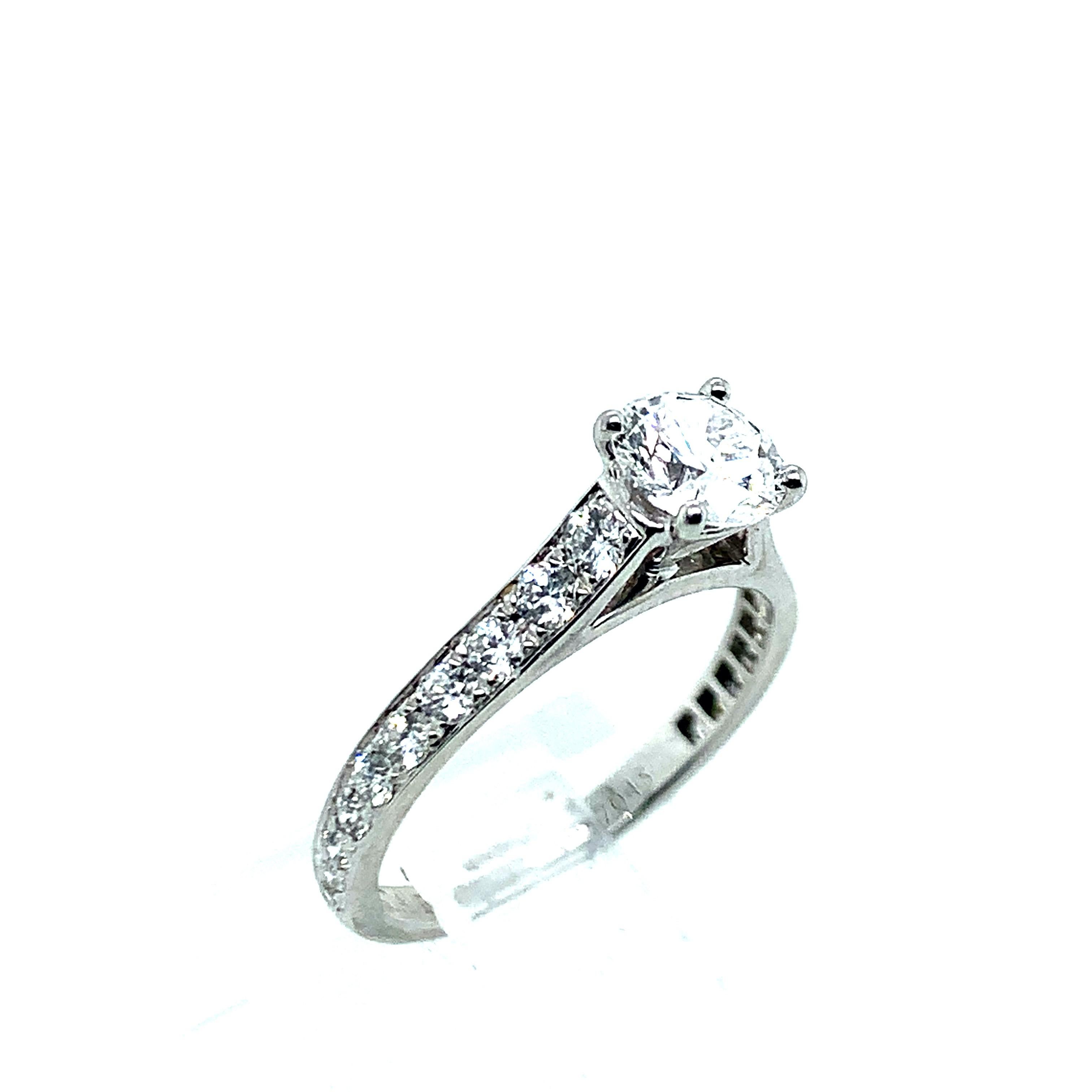 Created by Van Cleef & Arpels, this 0.43 carat diamond solitaire ring is set in platinum. It weighs 2.1 grams. Size 3. It comes with certificate of authenticity and proof of purchase. The diamond's color is D and has a clarity of Internally