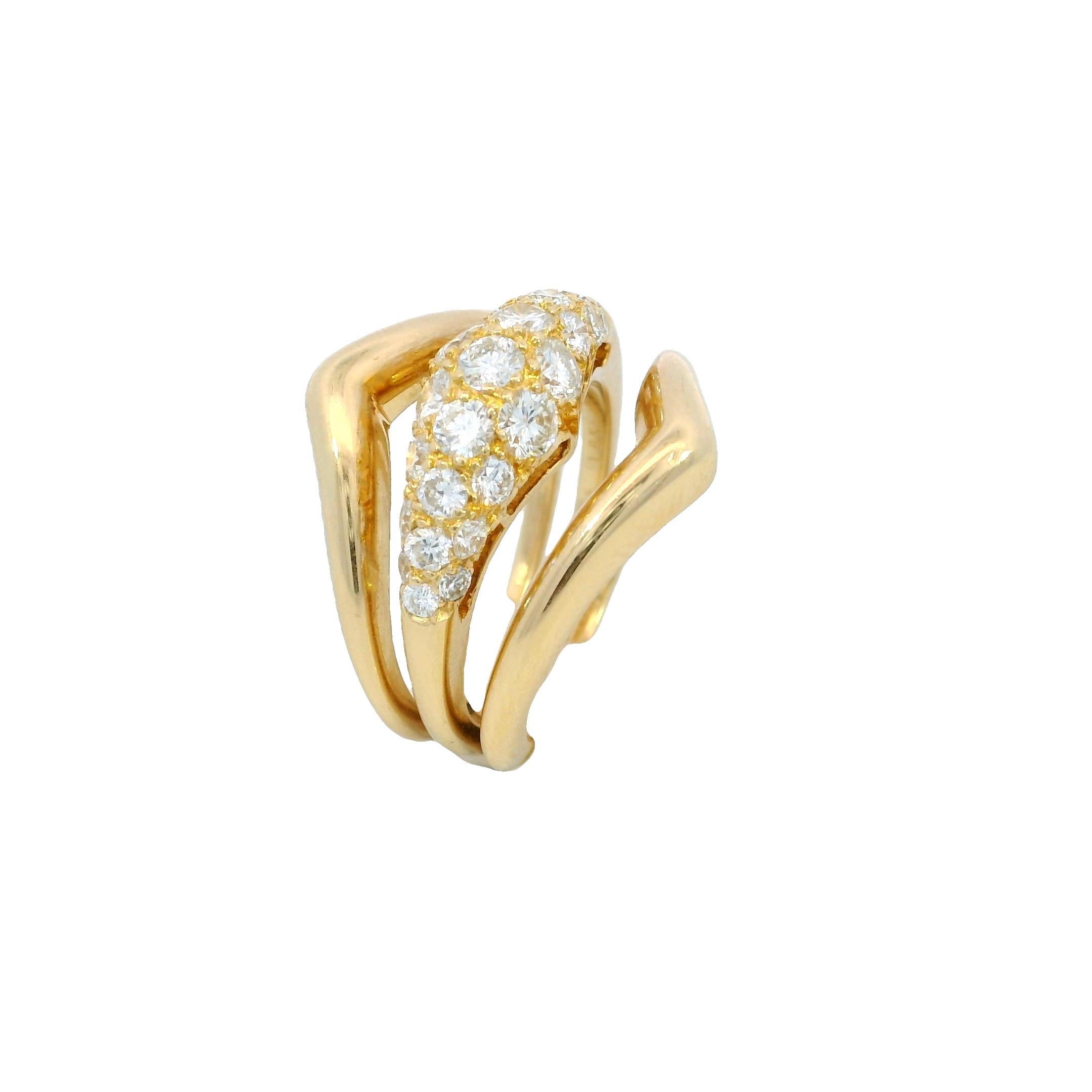 Van Cleef & Arpels Diamond Ring Three Piece Set 18K Yellow Gold Size 5.5

This sculptural 18k yellow gold ring presents a bold, layered silhouette with a refined sense of luxury. At its center, a cluster of round white diamonds—totaling ~1.15