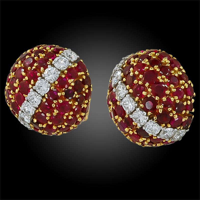 VAN CLEEF & ARPELS Province Ruby Bombe Earrings in 18k Yellow Gold.

A bejeweled pair of retro-style earrings by Van Cleef & Arpels exhibit a design emblematic of the Maison: the domed voluminous forms of 'Pelouse' (in some books this look is also