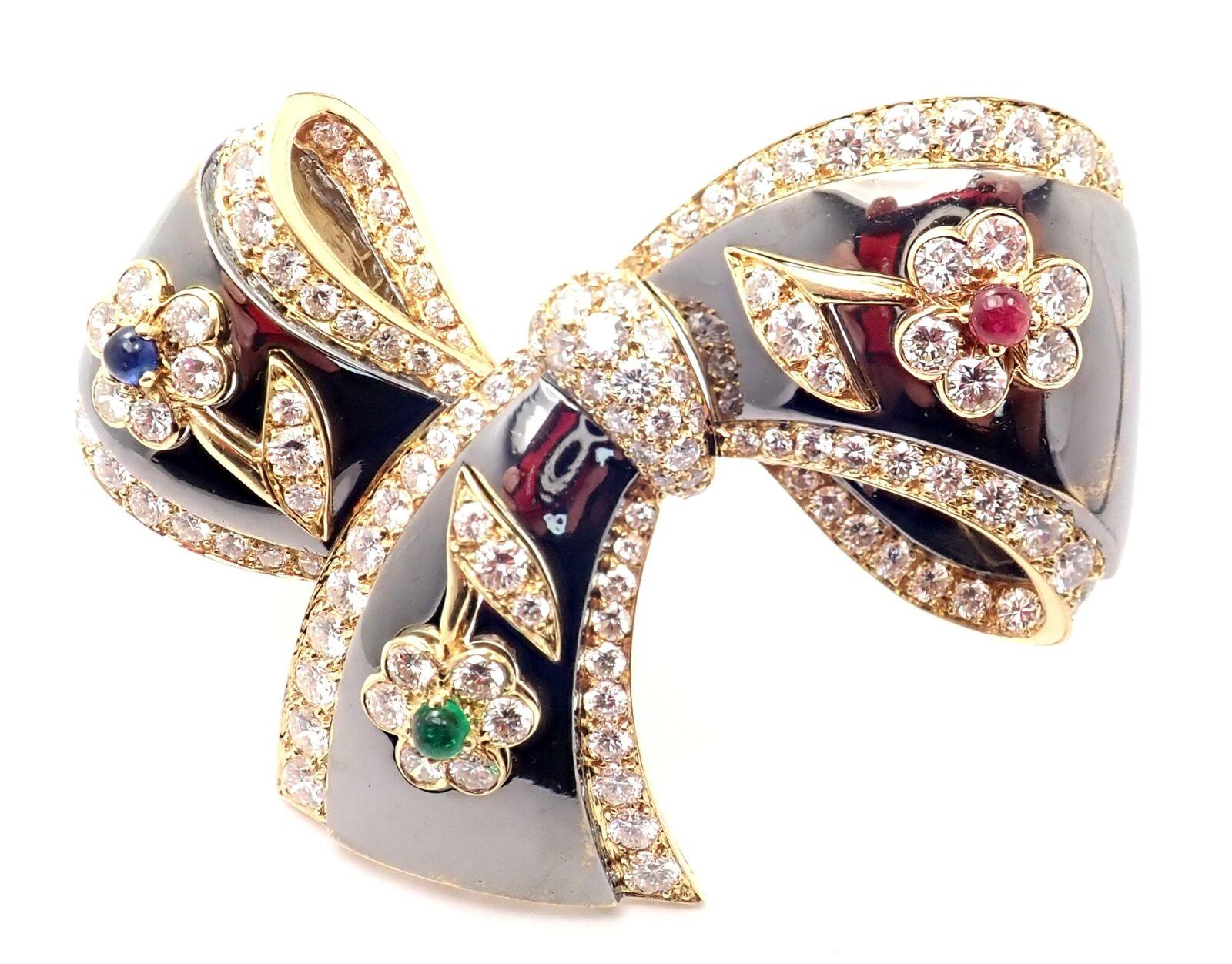 18k Yellow Gold Flower Diamond Emerald Sapphire Ruby Brooch Pin by Van Cleef & Arpels. 
With 126 round brilliant cut diamonds VVS1 clarity, E color total weight approx. 5.60ct
1 ruby, 1 emerald, 1 sapphire
Details: 
Measurements: 45mm x 57mm
Weight: