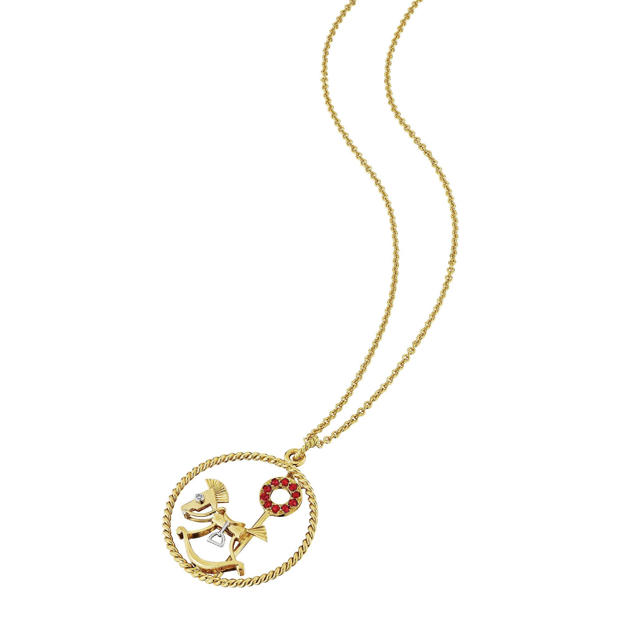 Giddy up!  Giddy up!  And take a ride on this whimsical Van Cleef & Arpels mid-century diamond, ruby, 18-karat yellow gold, and platinum rocking horse pendant charm necklace.  Signed Van Cleef & Arpels.  Serial number 69688.  Circa 1955.  Diameter 1
