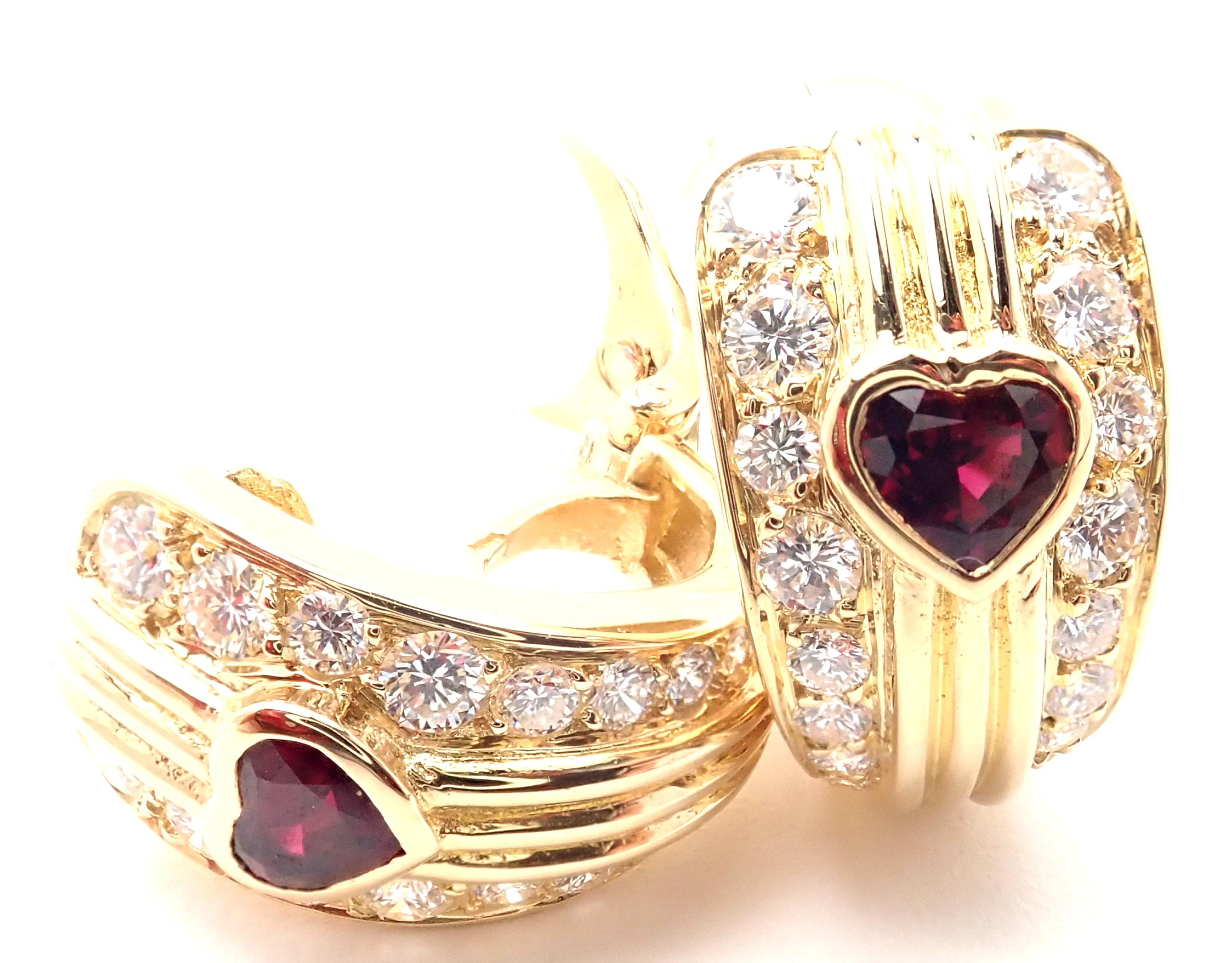 18k Yellow Gold Diamond And Ruby Heart Earrings by Van Cleef & Arpels. 
These earrings are made for non pierced ears, but they can be converted by adding posts. 
With 32 round brilliant cut diamonds VVS1 clarity, E color total weight approx. 1ct
2