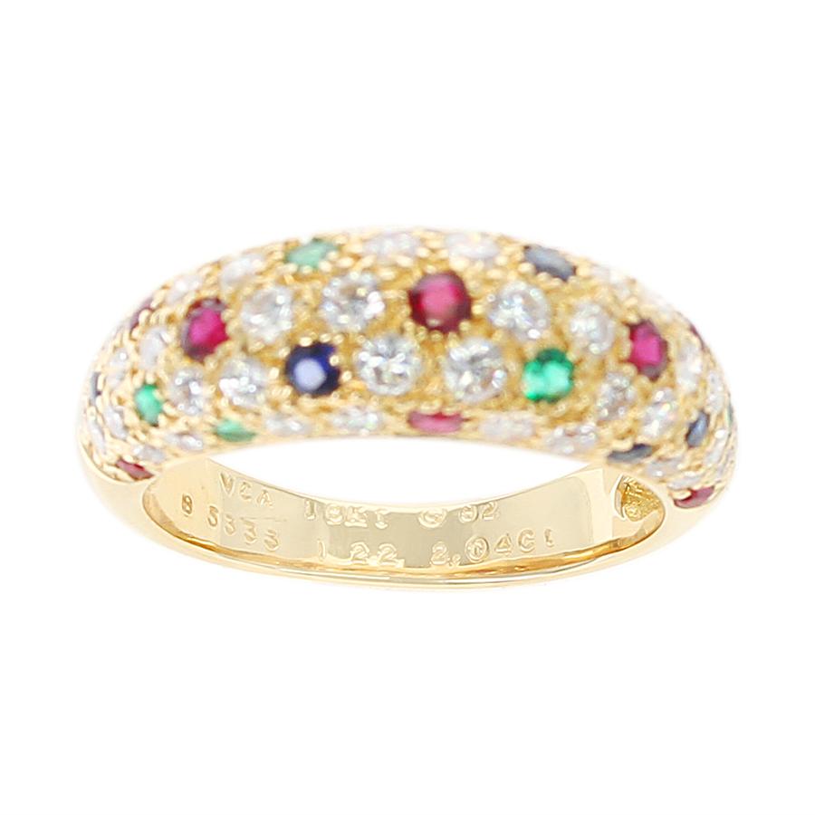 A Van Cleef & Arpels Diamond, Ruby, Sapphire, Emerald Ring in 18K Yellow Gold. 
Gem Weight: 2.04 carats.
Ring Size US 6. 
Total Weight: 5.24 grams.
