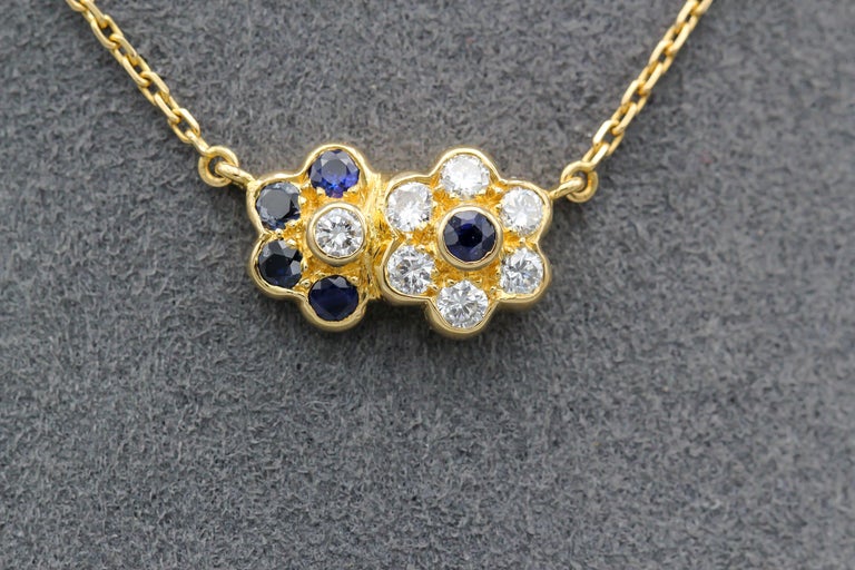 Round Cut Van Cleef & Arpels Diamond Sapphire 18k Gold Flower Pendant Necklace For Sale