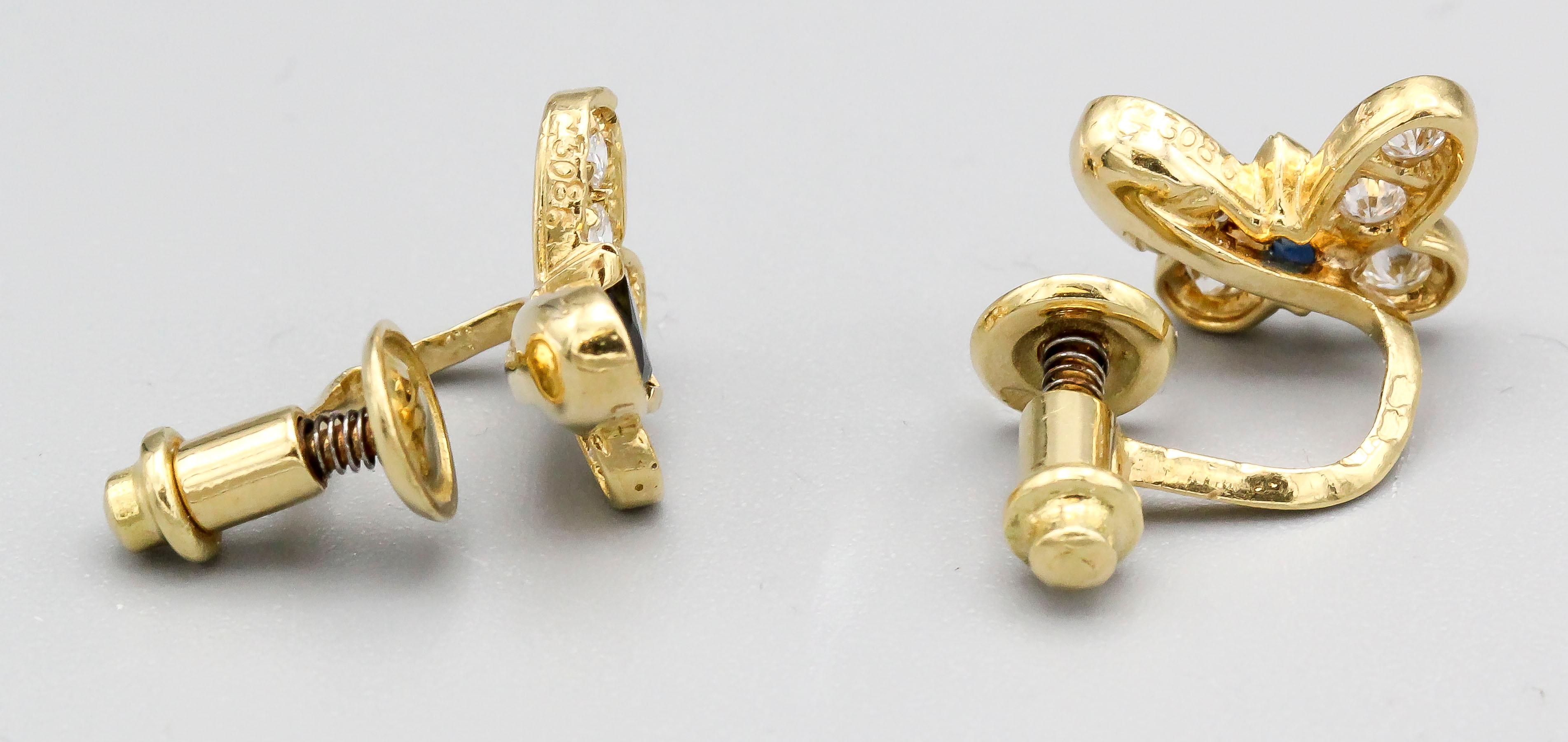 Fine diamond, blue sapphire and 18K yellow gold earrings resembling 