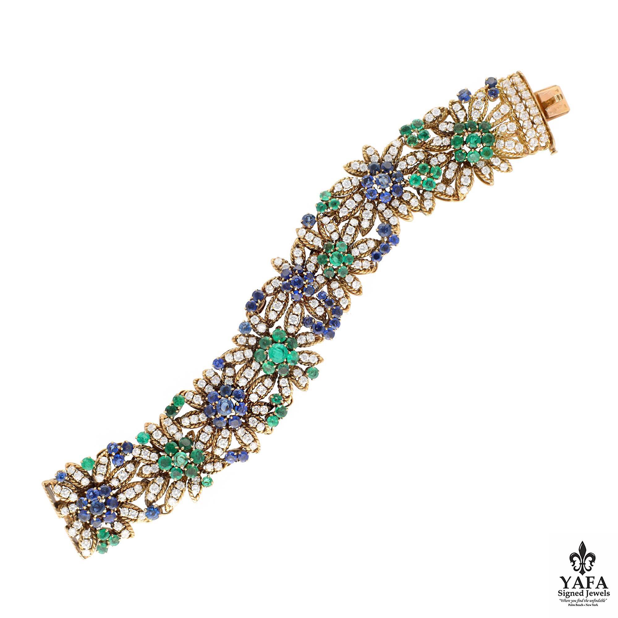 En la Antigüedad, antes de la aparición de las joyas, las mujeres llevaban flores, coronas tejidas y guirnaldas. Esta Perfección Ponible es un Jardín de Flores en Flor engastado en Oro Amarillo de 18 quilates compuesto por Diamantes, Zafiros y