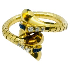 Van Cleef & Arpels, bracelet serpent en or, diamants et saphirs
