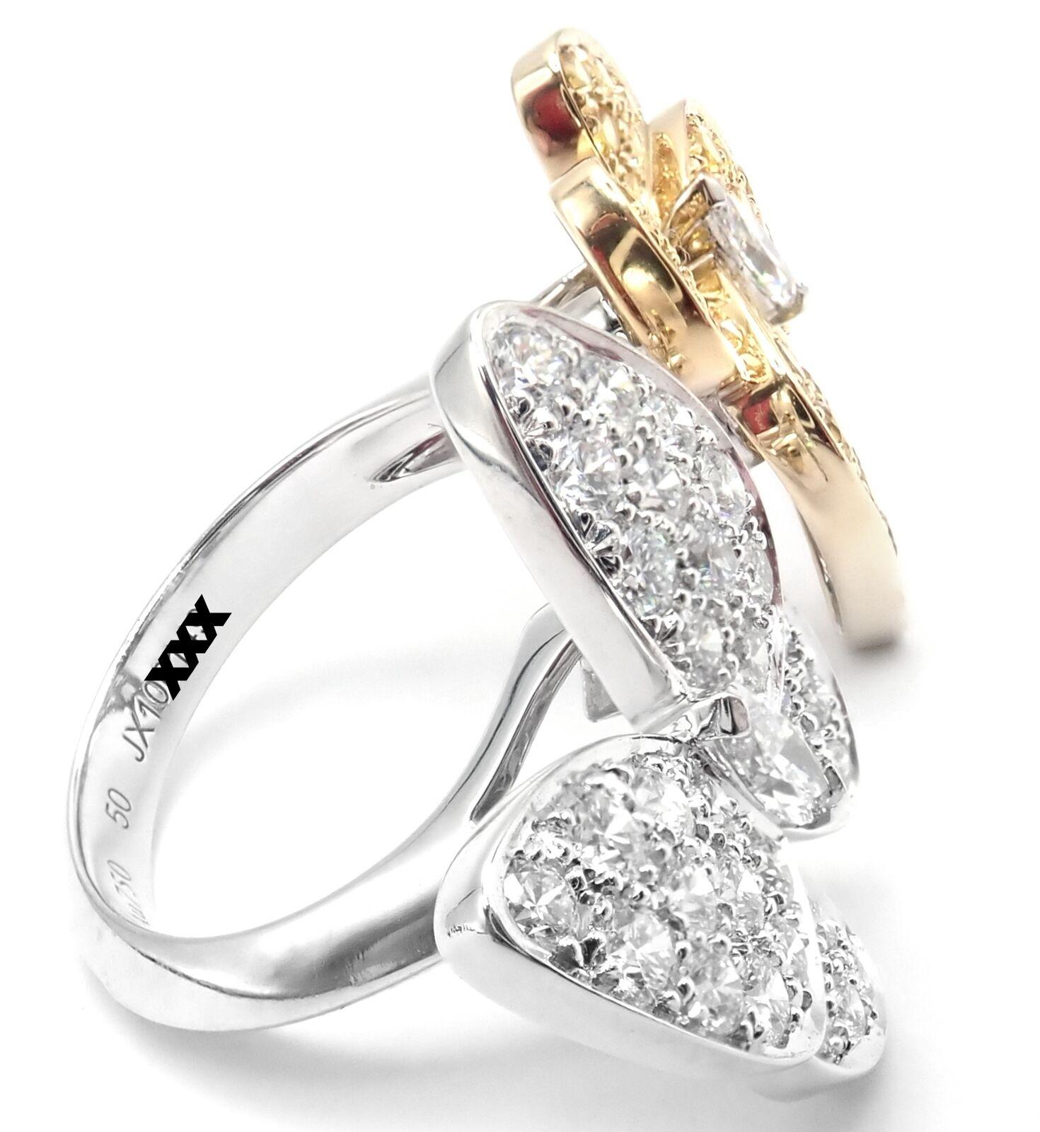 18k Weißgold Diamant und gelber Saphir zwei Schmetterling zwischen den Fingern Ring von Van Cleef & Arpels.
Mit 36 runden Diamanten im Brillantschliff VVS1 Klarheit, E Farbe Gesamtgewicht .99ct
34 runde gelbe Saphire Gesamtgewicht .88ct
Dieser Ring