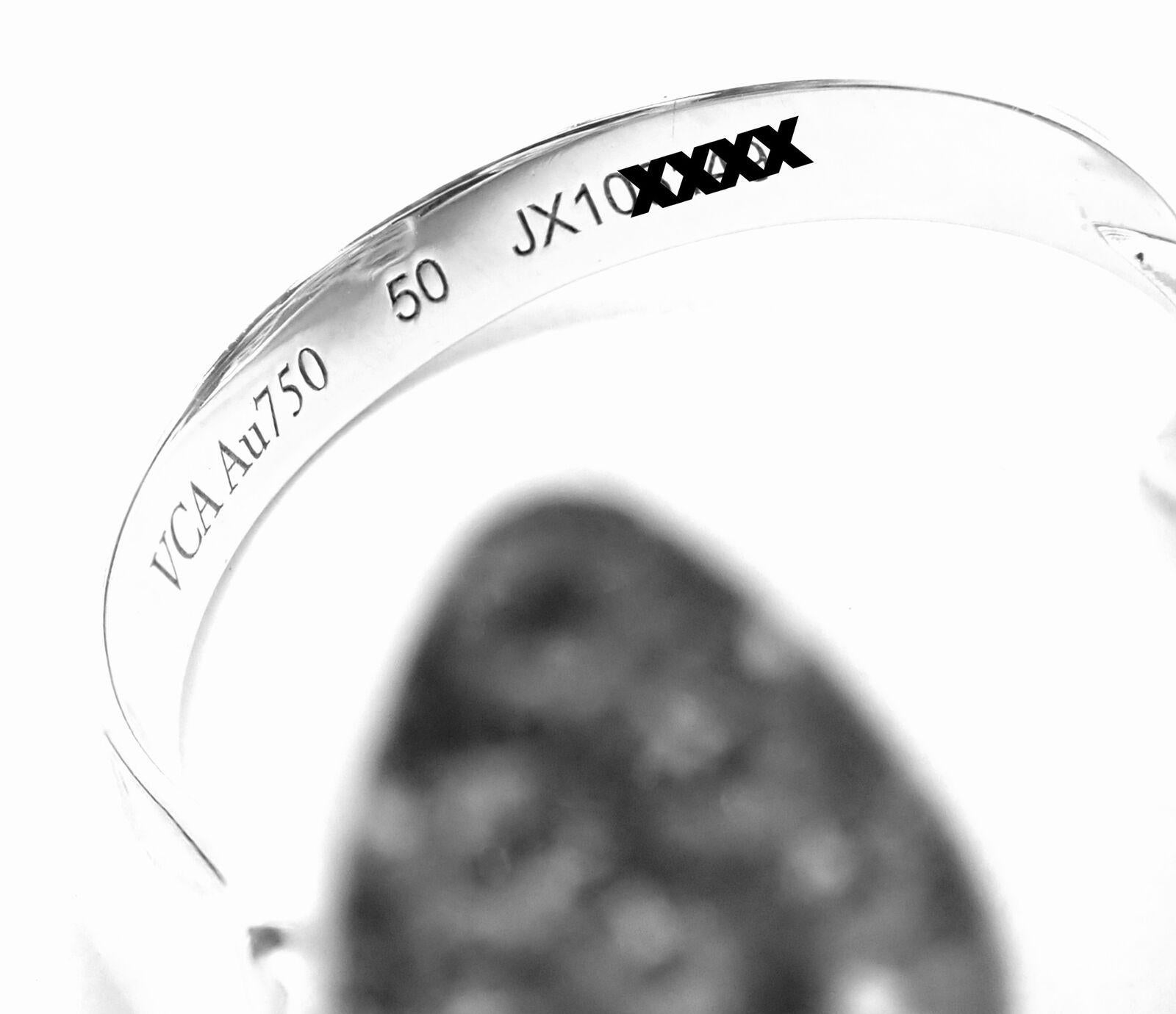 Van Cleef & Arpels Bague deux papillons entre les doigts en or blanc avec diamants et saphirs Excellent état à Holland, PA