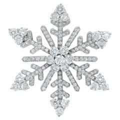 Van Cleef & Arpels Spilla a fiocco di neve con diamanti in 18 carati Van Cleef & Arpels Spilla a fiocco di neve con diamanti in 18 carati
