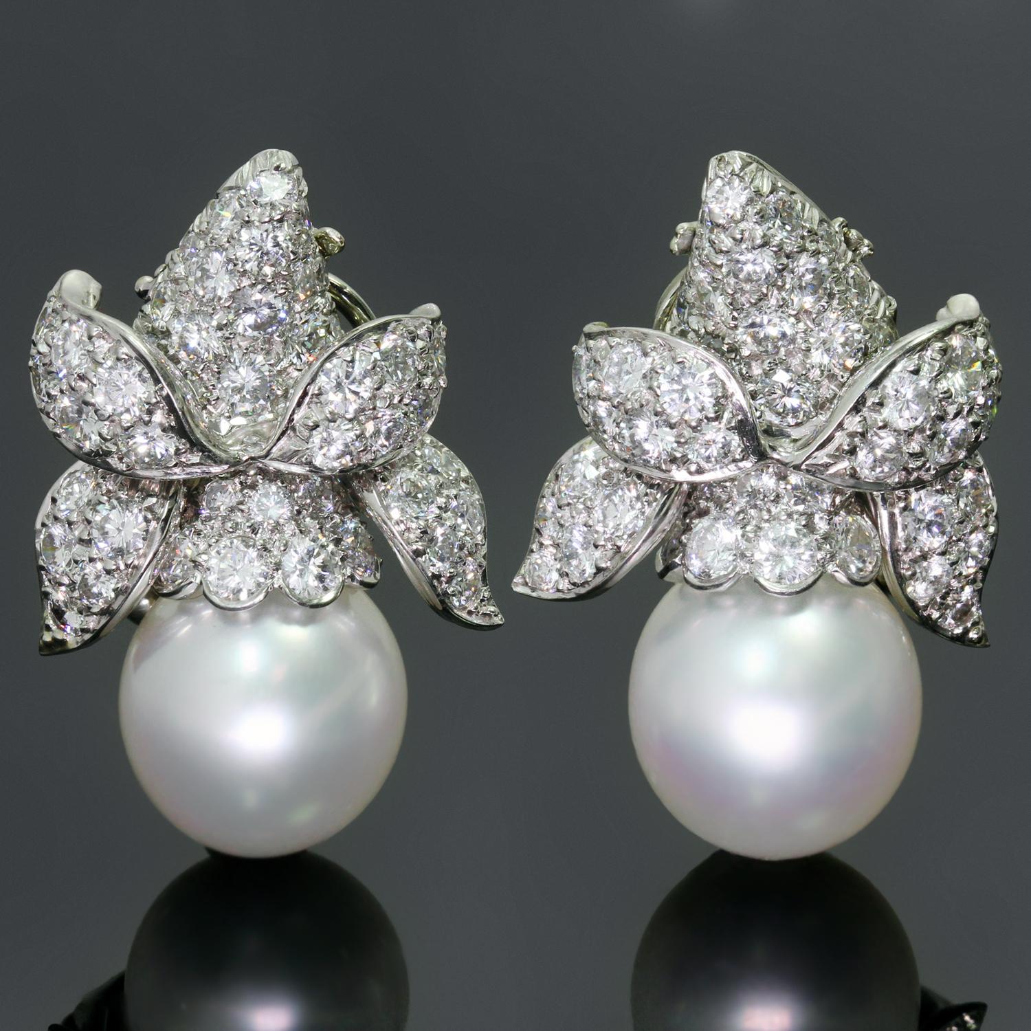 These magnificent Van Cleef & Arpels clip-on earrings feature a floral design crafted in 950 platinum and set with 80 brilliant-cut round diamonds of an estimated 5.0 - 5.50 carats and completed with detachable clean, pure white, high luster South