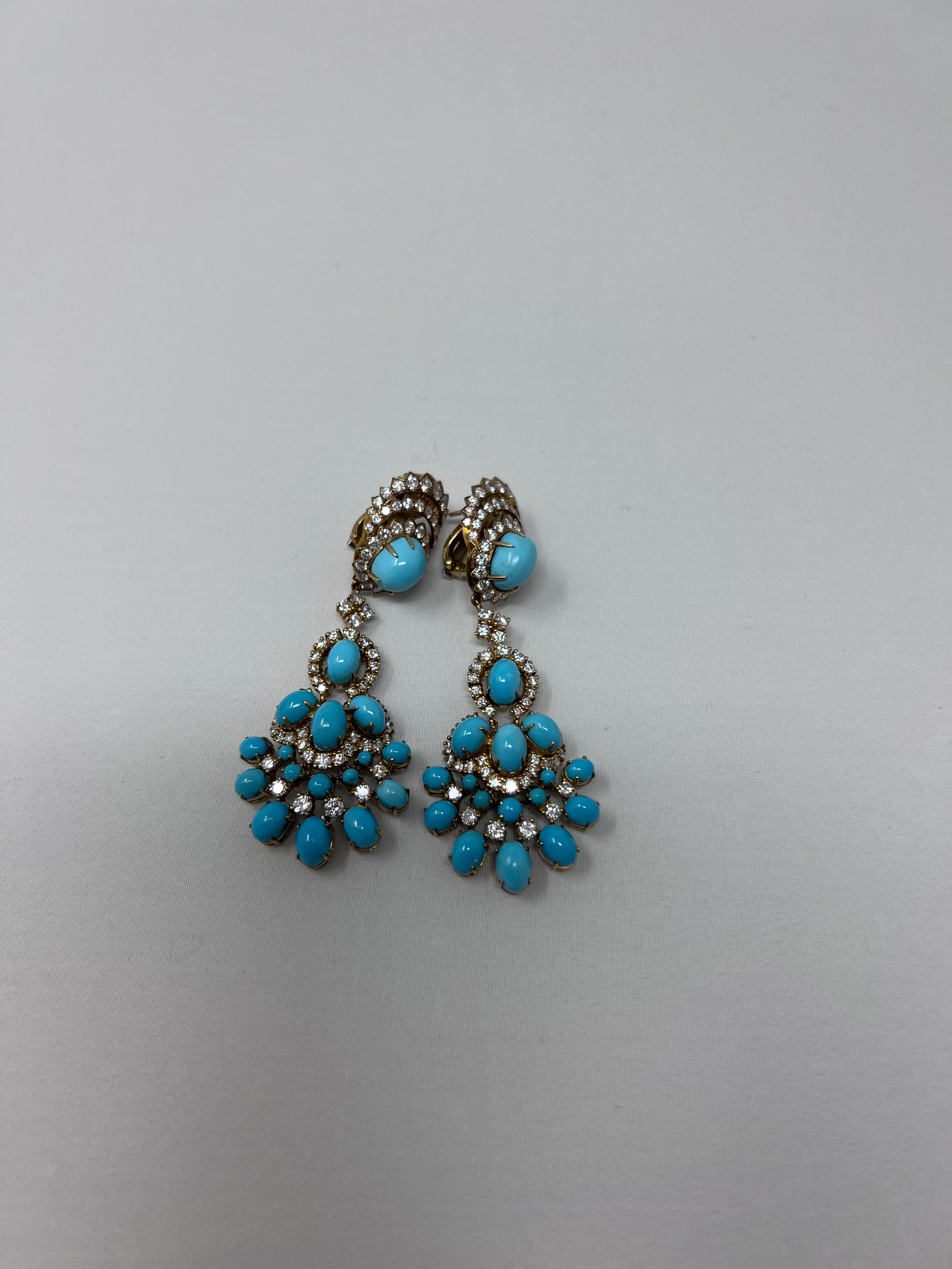 Vintage Van Cleef & Arpels pendant earrings crafted in 18k yellow gold, featuring dazzling diamonds (D-E color, VS clarity) and exceptional Persian turquoise. Designed with detachable pendants, these earrings highlight the finest materials and