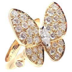 Van Cleef & Arpels Bague deux papillons en or jaune avec diamants