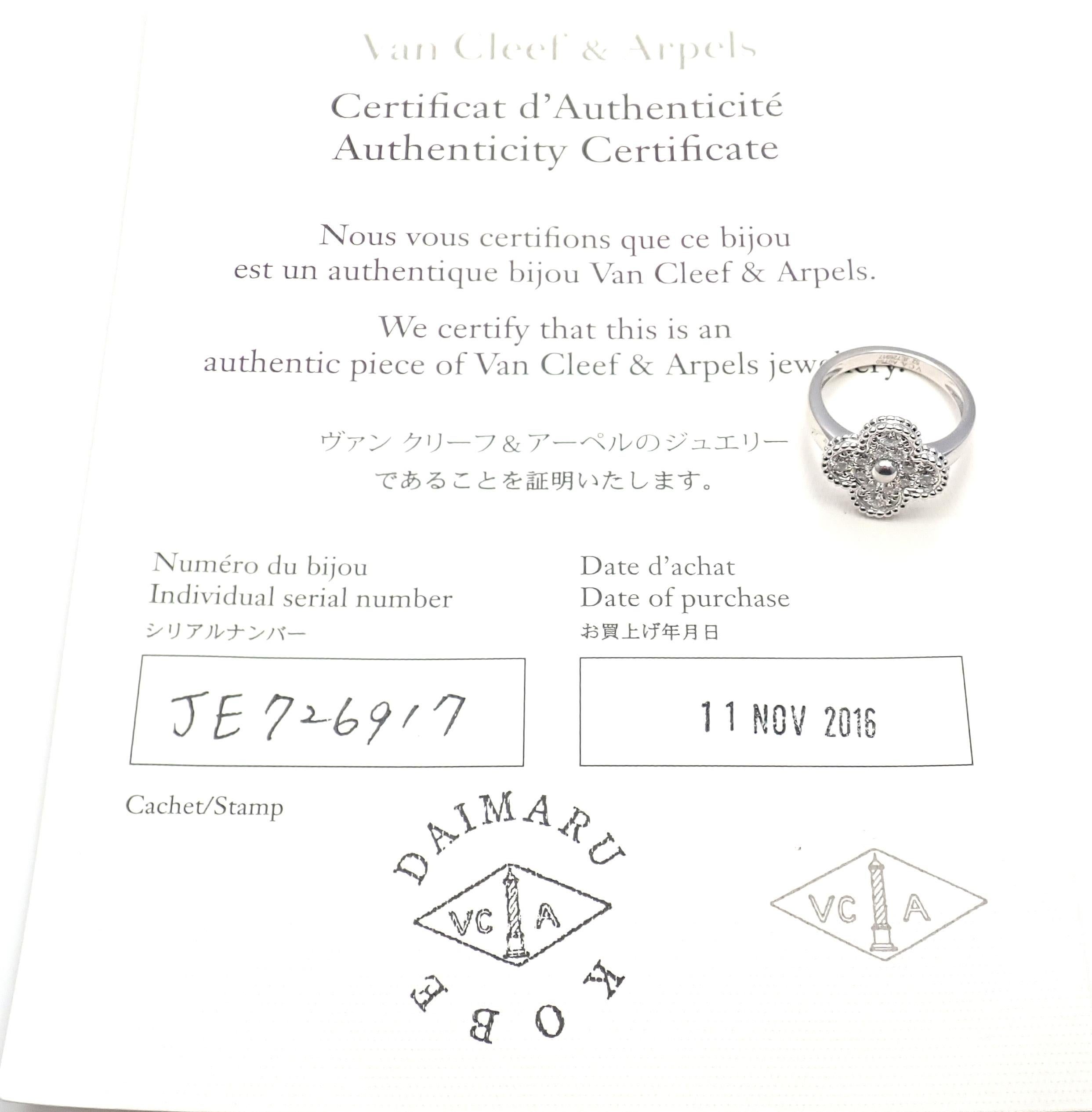 8k White Gold Diamond Vintage Alhambra Ring by Van Cleef & Arpels. 
With 12 round brilliant cut diamond VVS1 clarity, F color total weight .48ct 
This ring comes with Van Cleef & Arpels certificate of authenticity.
Details: 
Size: European 52, US