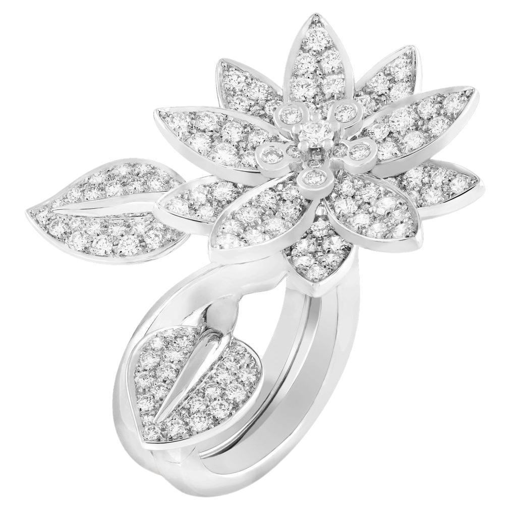 A symbol of beauty, purity and fulfillment, the lotus flower has inspired Van Cleef & Arpels to create dazzling and harmonious jewelry creations. The ring for consideration today is the lotus between the finger ring, it is crafted in 18k white gold