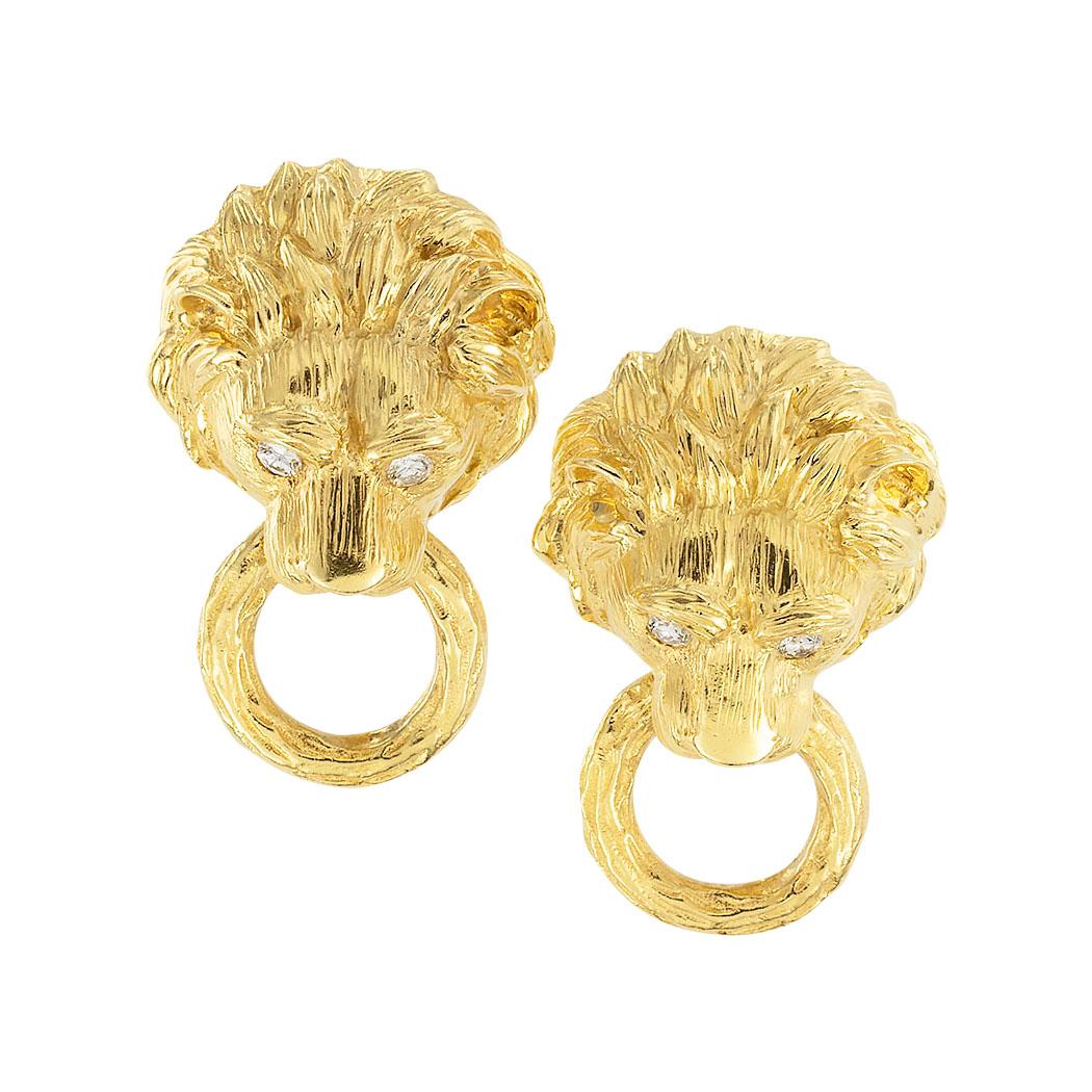 Van Cleef & Arpels diamond and yellow gold lion head door knocker earrings circa 1960.  Clear and concise information you want to know is listed below.  Contact us right away if you have additional questions.  We are here to connect you with