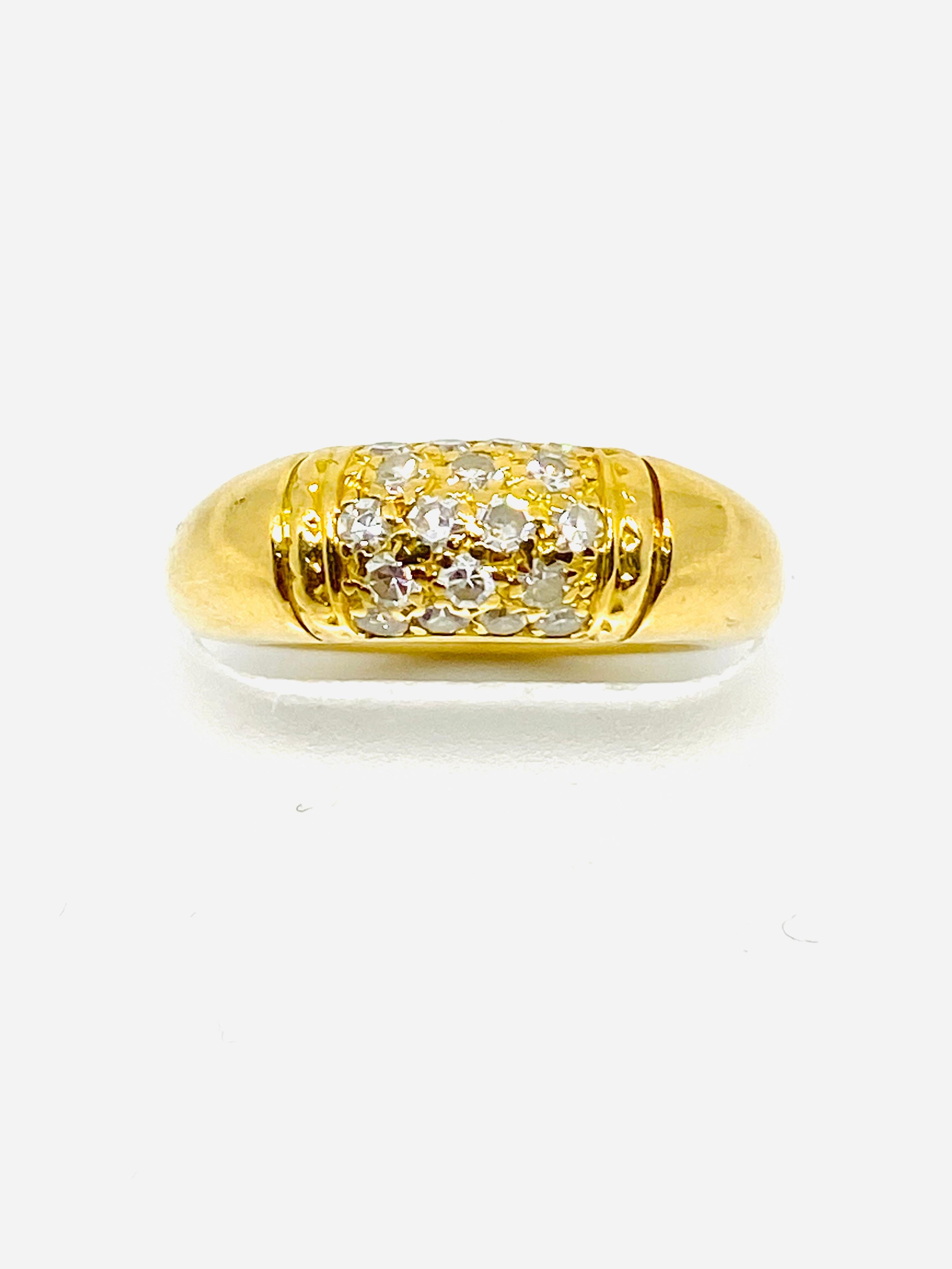 Product details:
Material: 18K Yellow Gold
Gemstone: 18 round brilliant cut diamonds 38cts F-G/ VVS2-VS1
Measurements: 0.5” long and 0.25” high, 0.25” wide 
Ring Size: 5- 5.25
Weight: 8.9 g.
Hallmarks: VCA, 750, 68, 115530