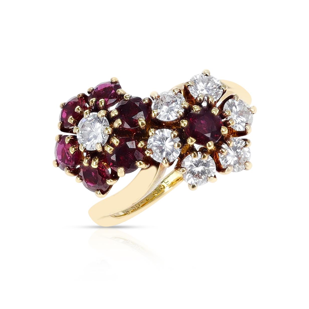 A romantic Van Cleef & Arpels Double Floral Ruby and Diamond Toi et Moi Ring made in 18k Yellow Gold. Ring Size US 5.25. The total weight is 5.86 grams. 