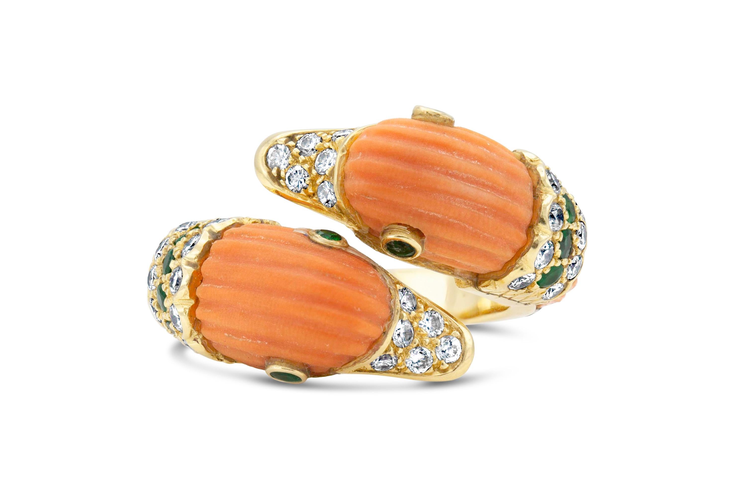 Finely crafted in 18k yellow gold with carved Coral, Diamonds, and Emeralds.
Signed by Van Cleef & Arpels
Size 4 3/4
