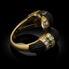 Van Cleef & Arpels Double Headed Swan Ring In Black Onyx With Diamonds Emeralds