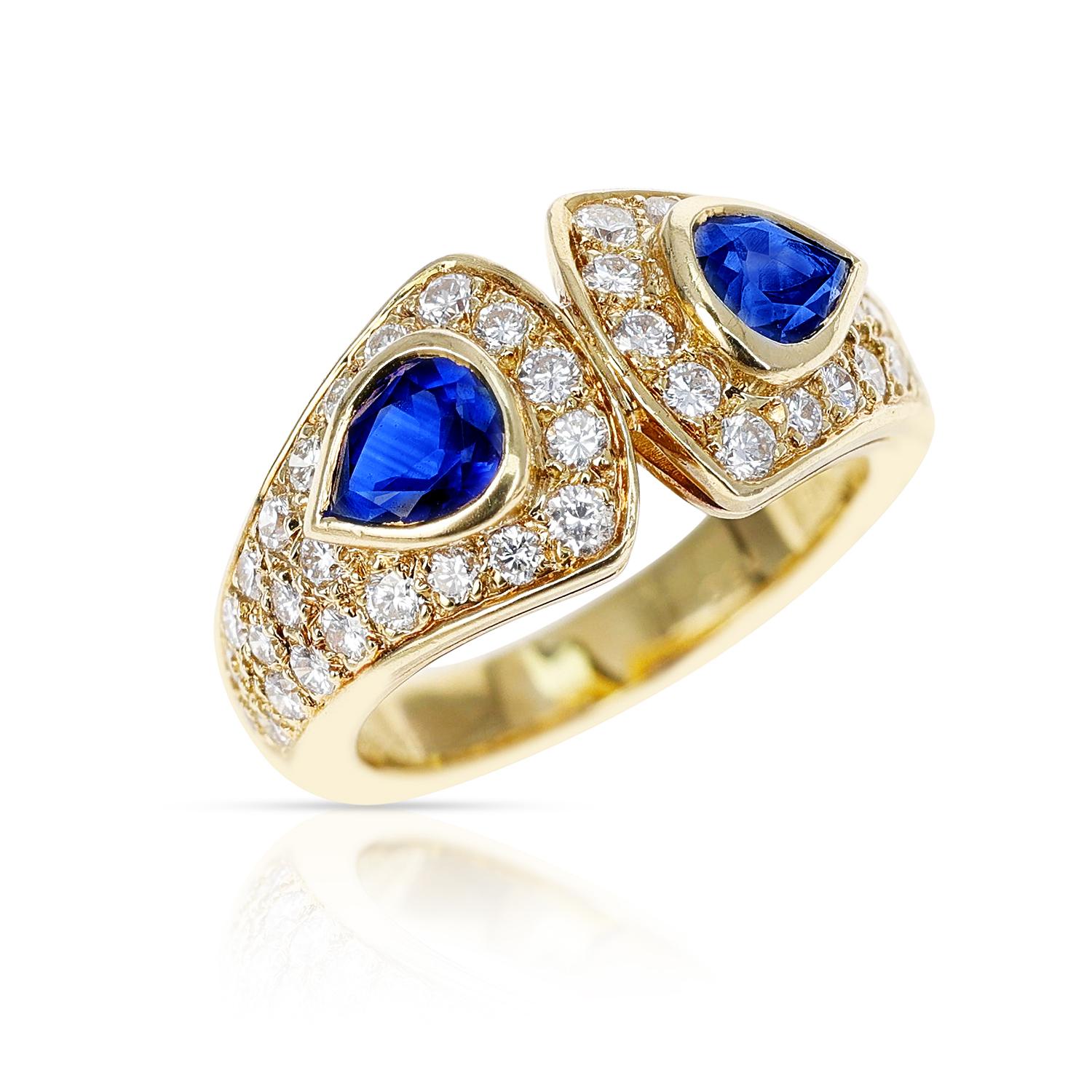 Van Cleef & Arpels Double Pear Shape Sapphire and Diamond Ring made in 18K Yellow Gold. 
The total weight is 7.50 grams. Ring Size US 5.25. 

SKU: 505-MCEJJPL