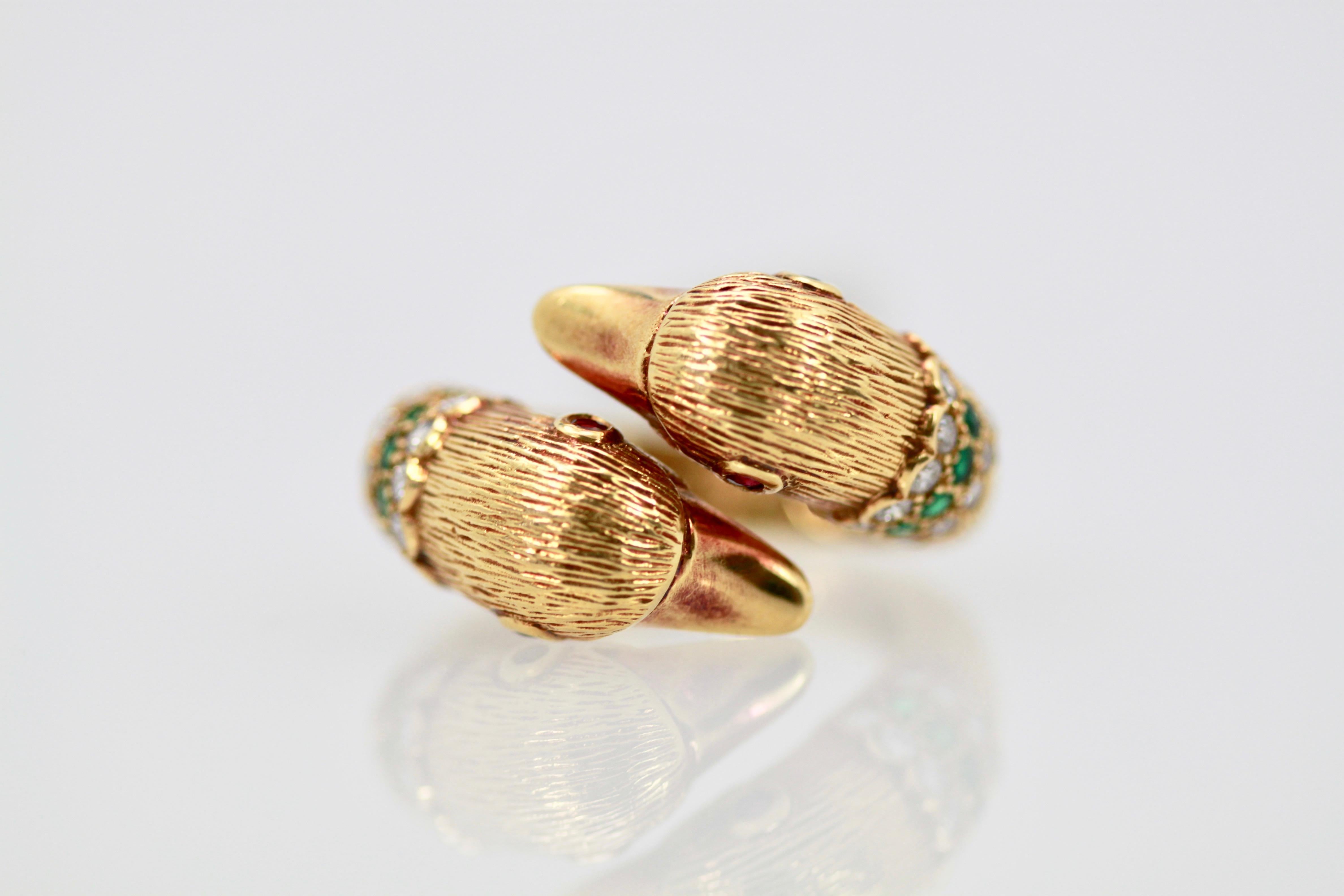 This gorgeous double swan ring from VCA is done in 18K Yellow Gold with a beautiful brushed finished.  This is only the second time in over 15 years that I have seen this ring.  I also have the same ring in Onyx and it was also done in Coral but