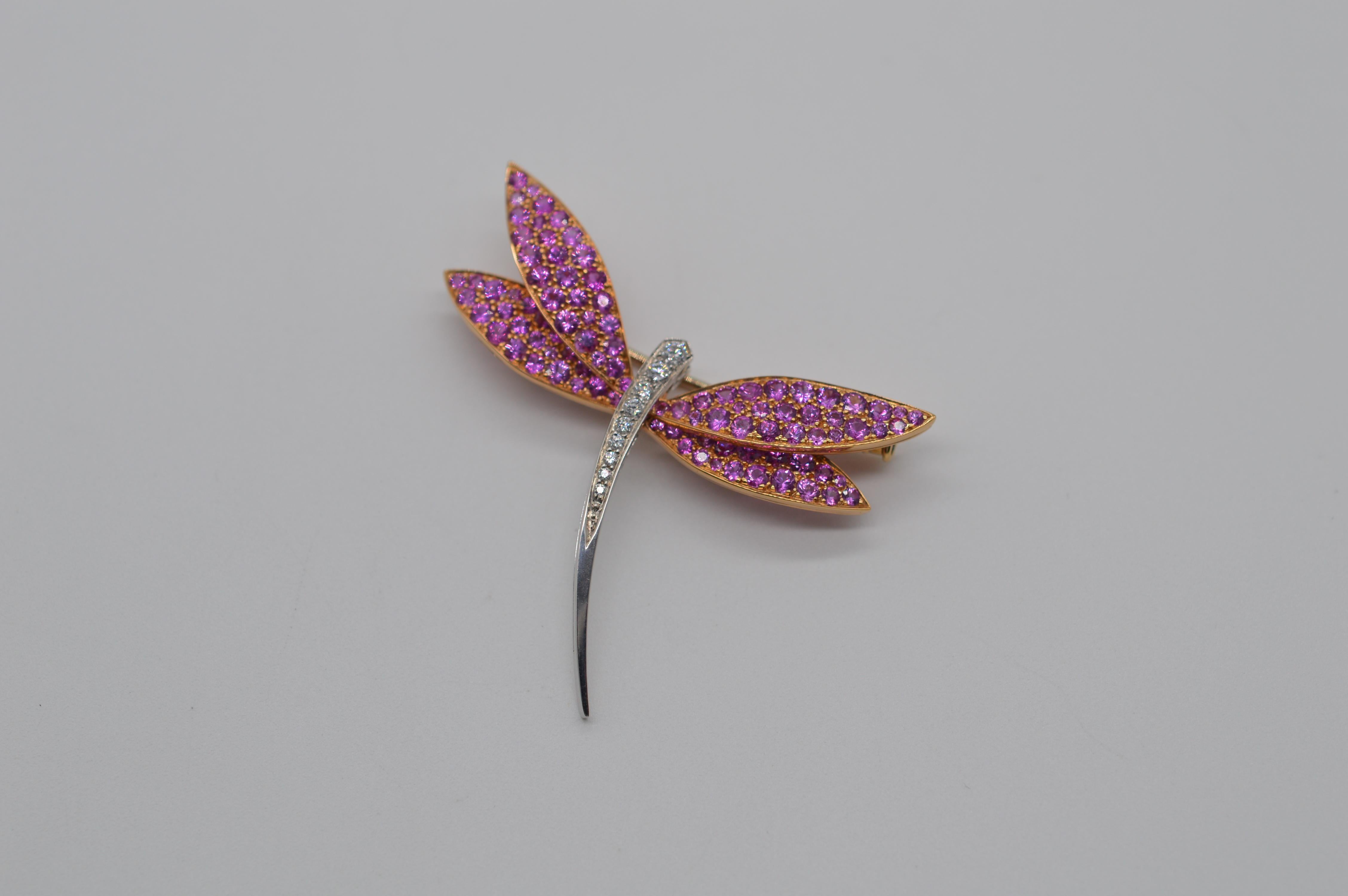 Van Cleef & Arpels Dragonfly Brooch Unworn
18K Yellow & White Gold
Weight 7.8 grams
Diamond & Pink Sapphires Setting
Set with 9 Round Diamond for a total weight of 0.24 carats ( Color D-E / Clarity VVS1-VVS2 ) / Set with 92 Pink Sapphires for an